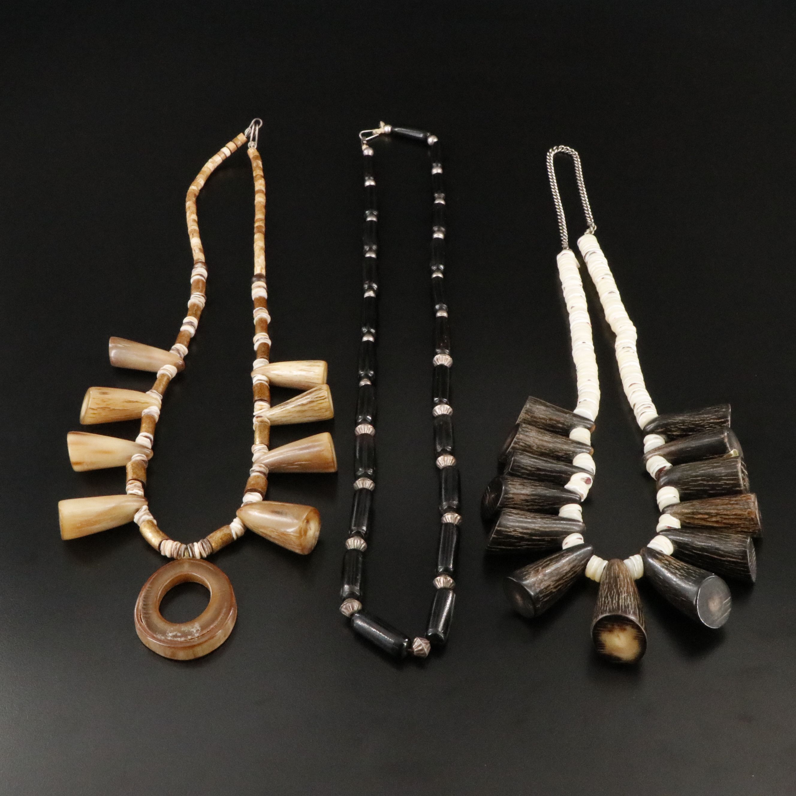 Horn, Coral and Turquoise Featured in Necklaces