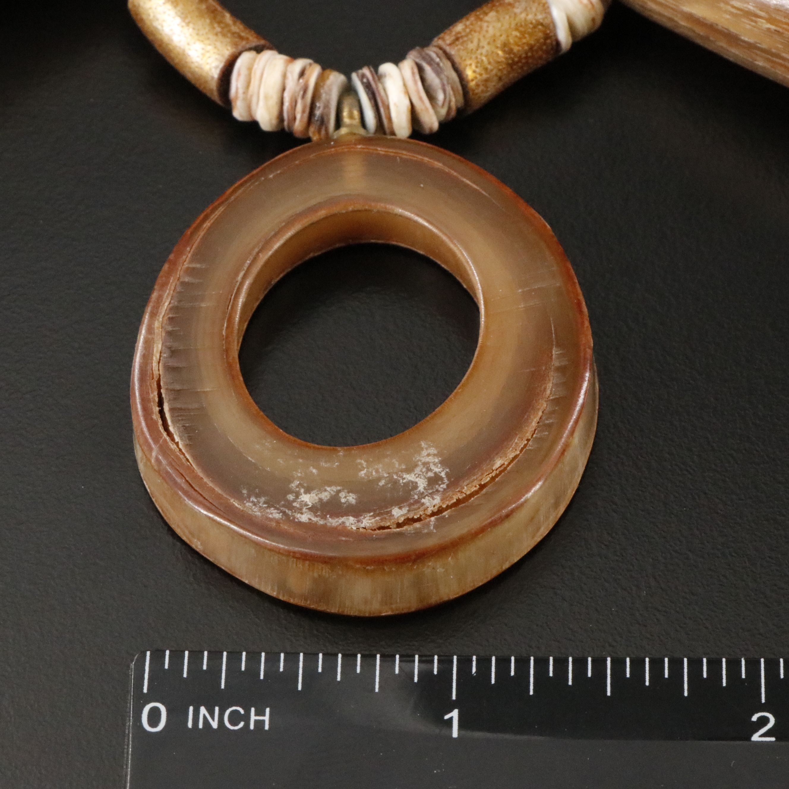 Horn, Coral and Turquoise Featured in Necklaces