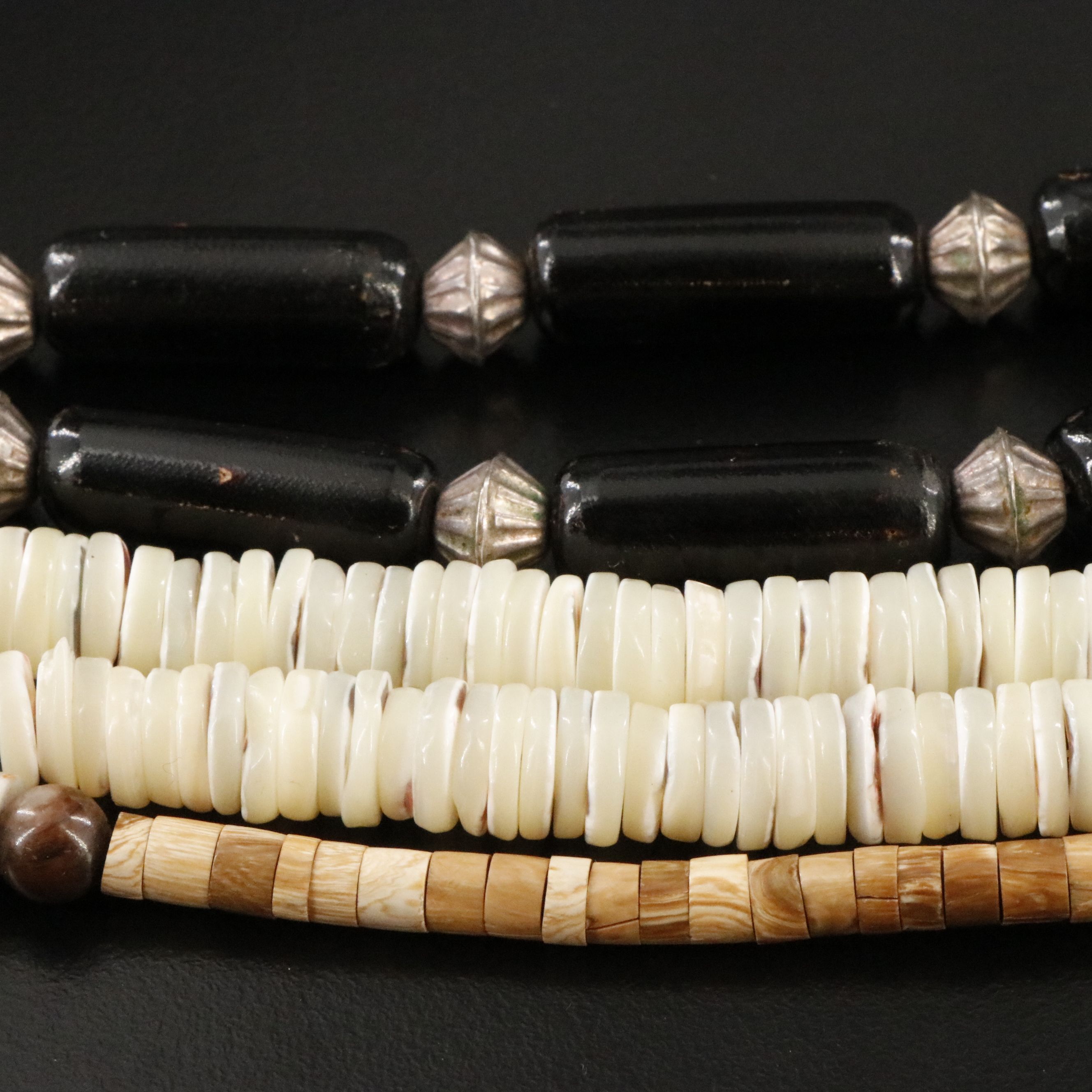 Horn, Coral and Turquoise Featured in Necklaces