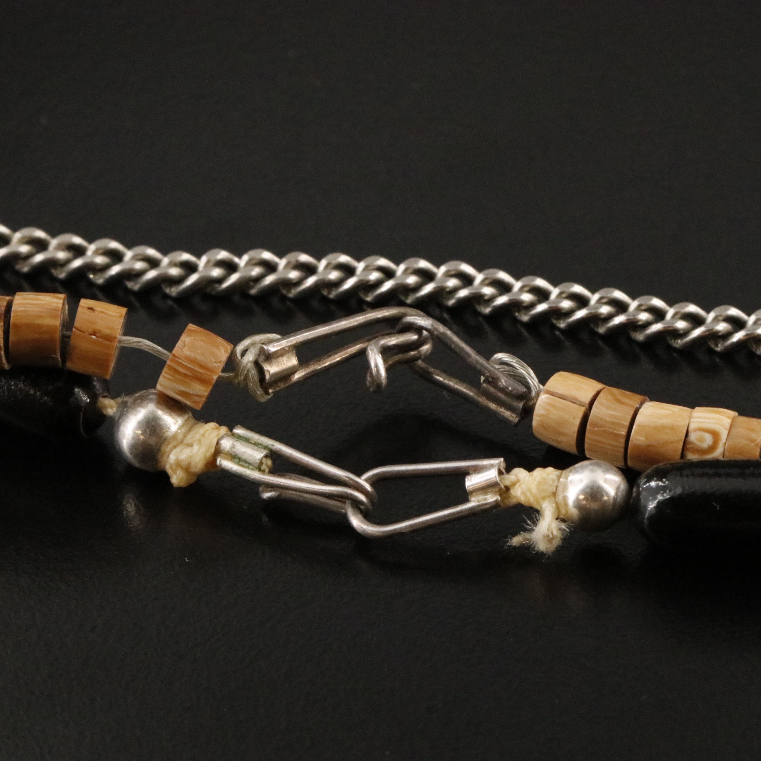 Horn, Coral and Turquoise Featured in Necklaces