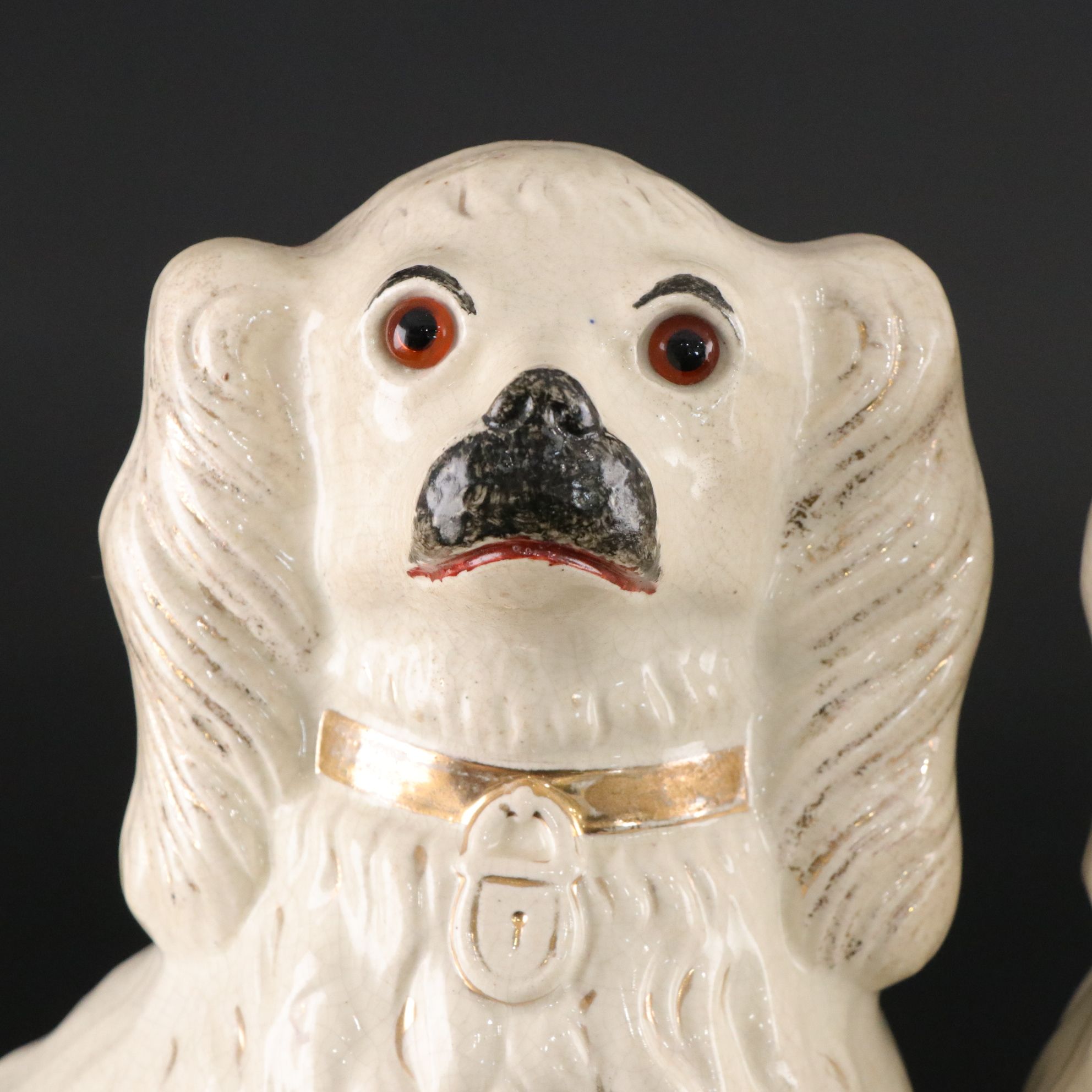 Pair of Staffordshire Spaniels with Glass Eyes, Late 19th/ Early 20th Century