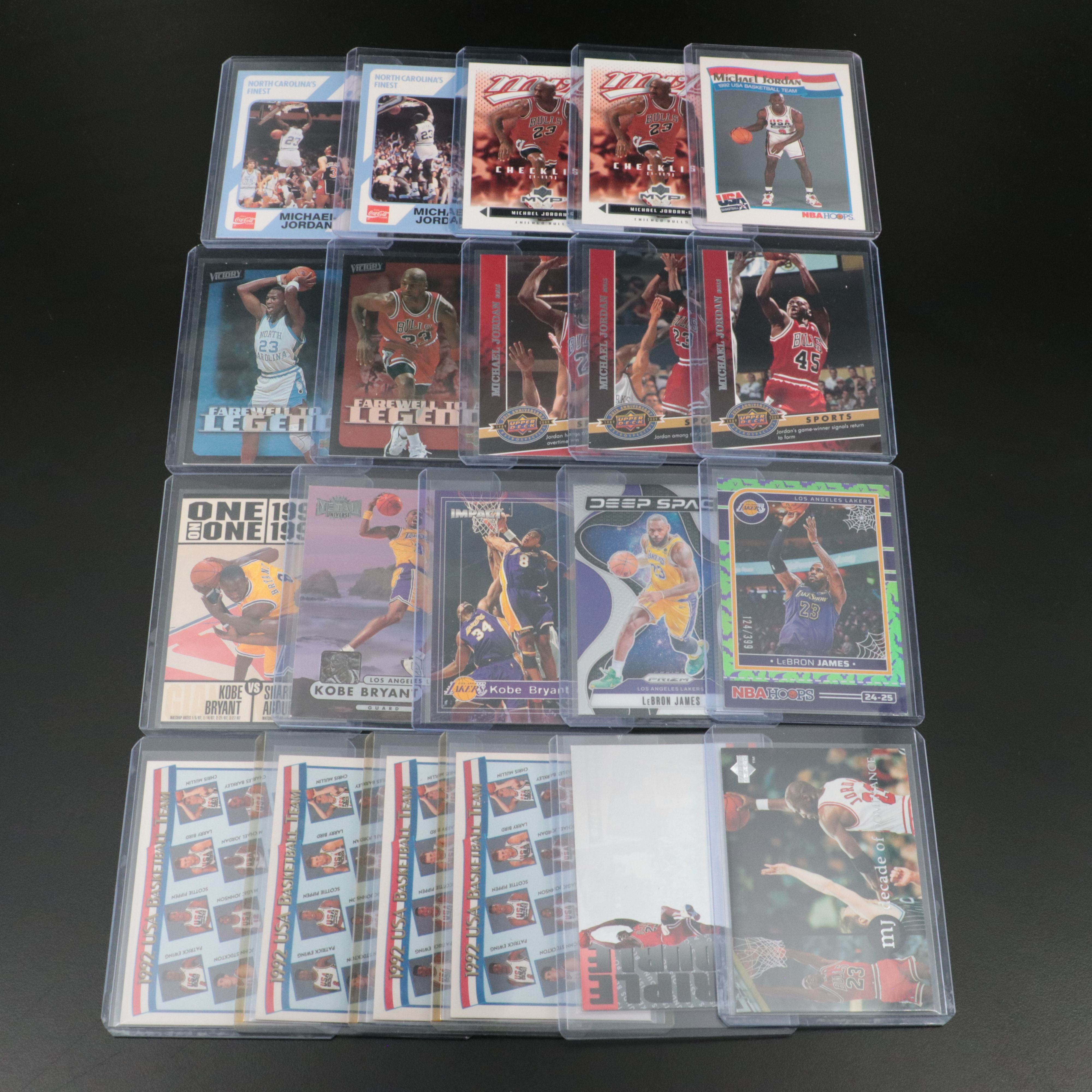Twenty-One Basketball Cards of Michael Jordan, Kobe Bryant, and LeBron James