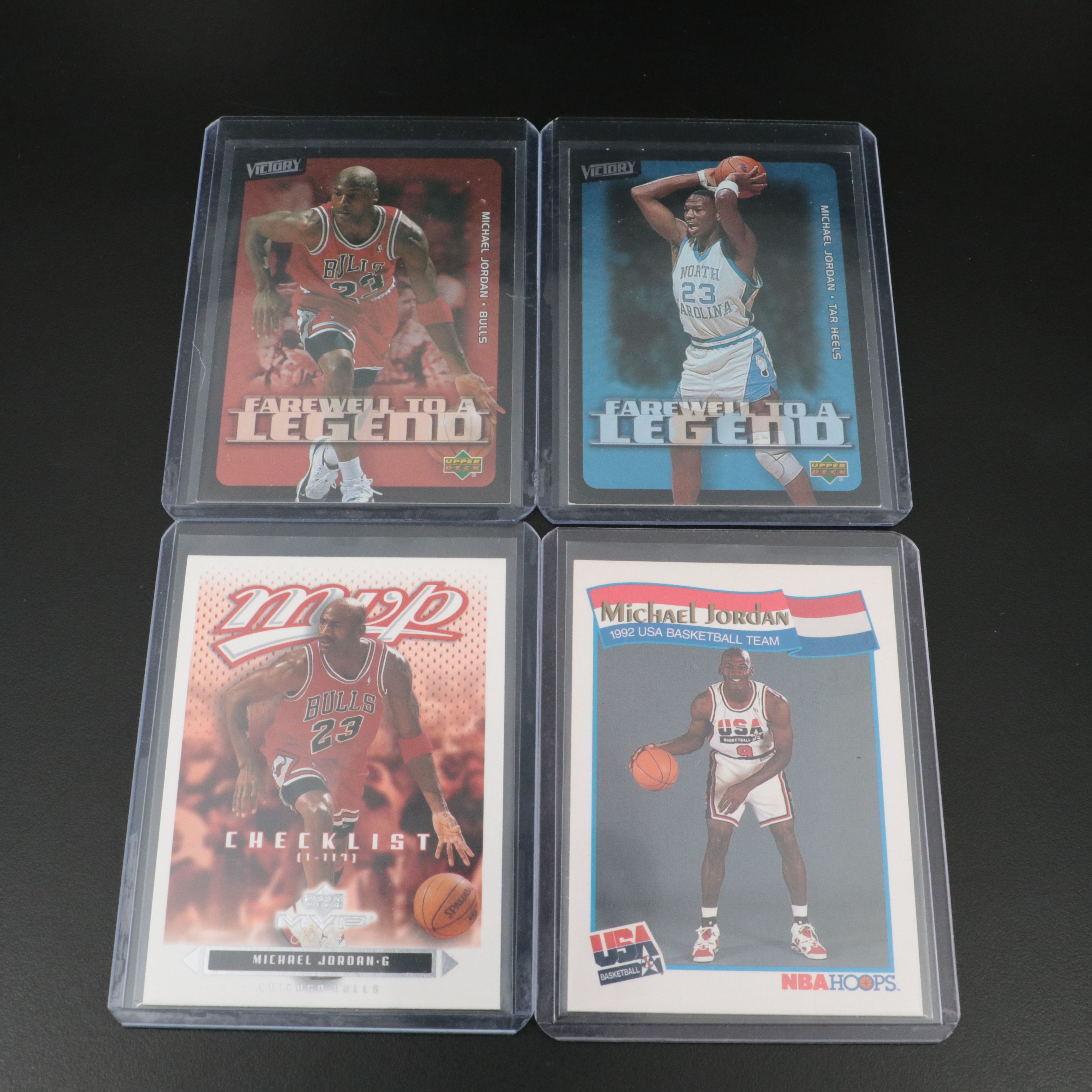 Twenty-One Basketball Cards of Michael Jordan, Kobe Bryant, and LeBron James