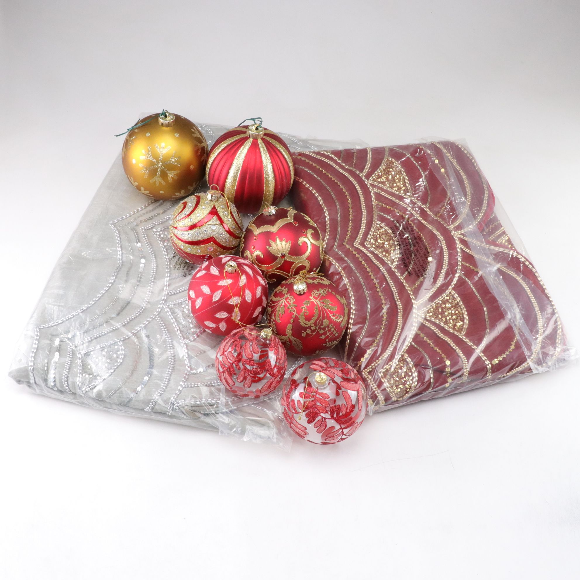 Red and Silver Pair of Sequin Tree Skirts with Embellished Glitter Ornaments
