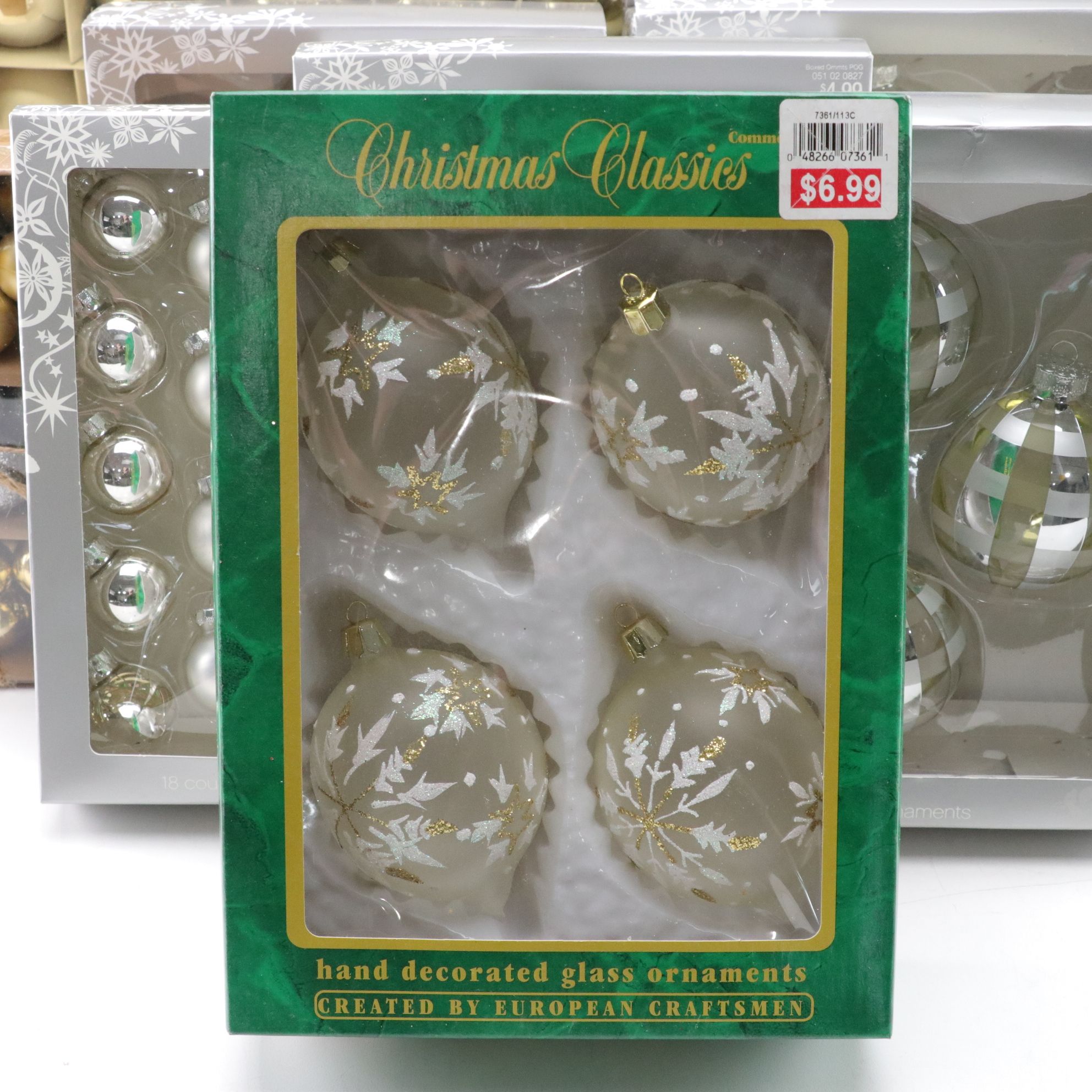 Assorted Glitter and Glass Ornaments in Silver, Gold and Blue Hues