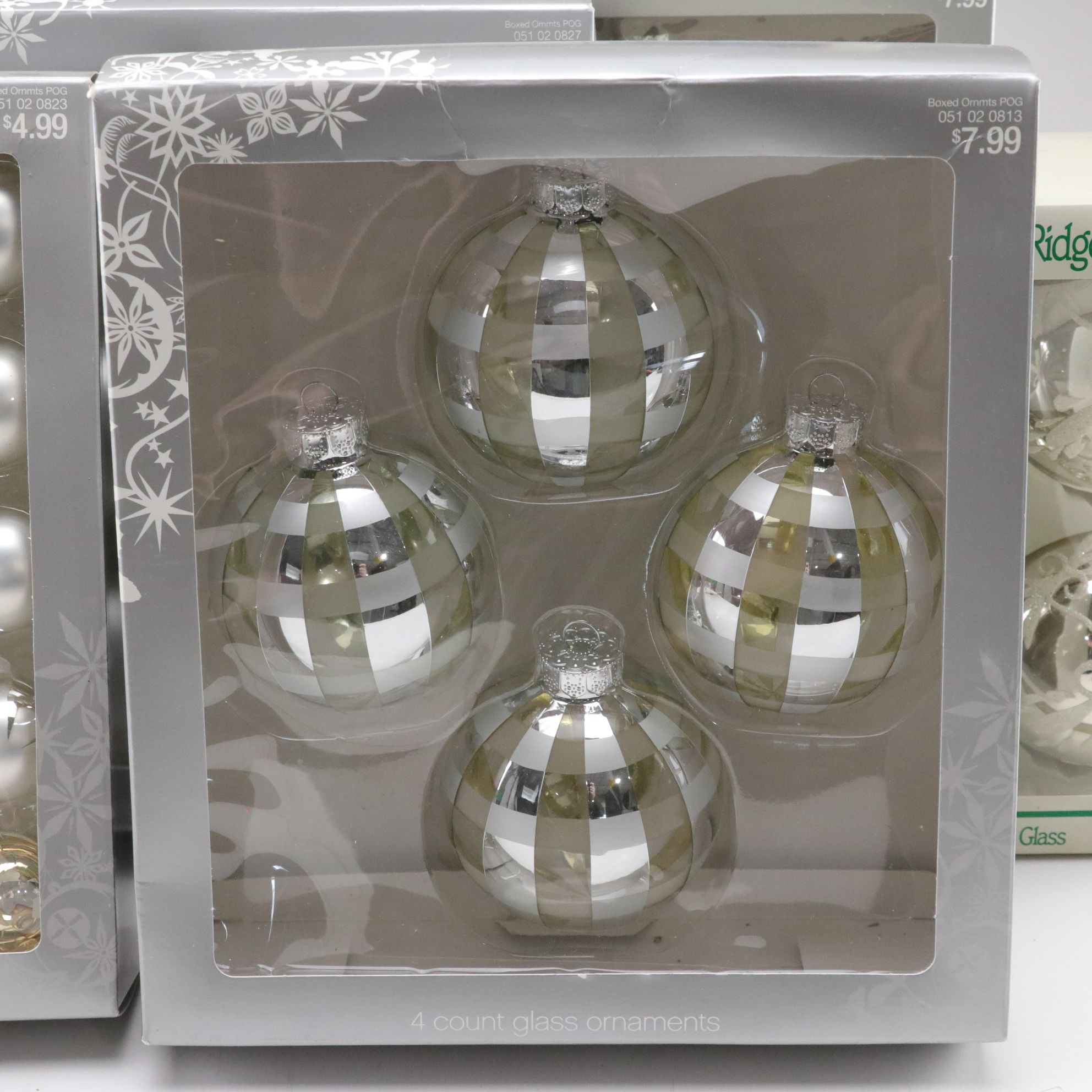 Assorted Glitter and Glass Ornaments in Silver, Gold and Blue Hues