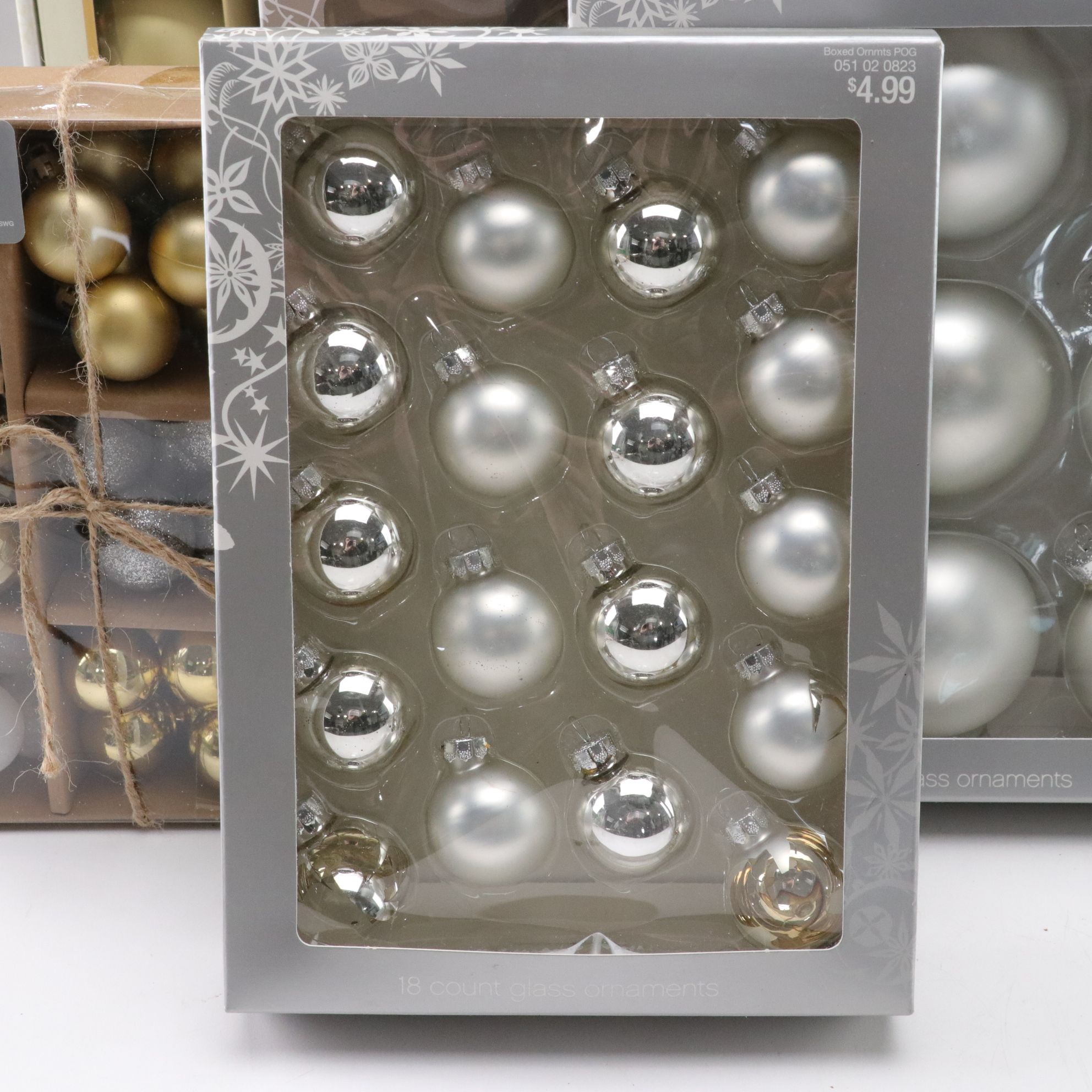 Assorted Glitter and Glass Ornaments in Silver, Gold and Blue Hues