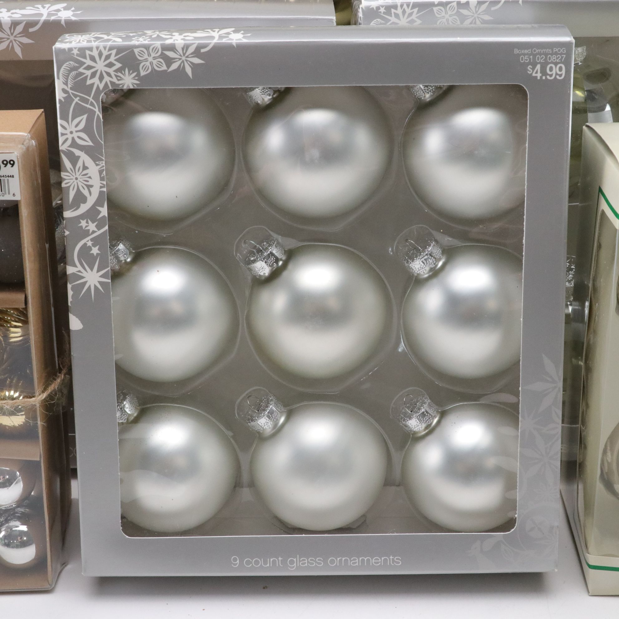 Assorted Glitter and Glass Ornaments in Silver, Gold and Blue Hues