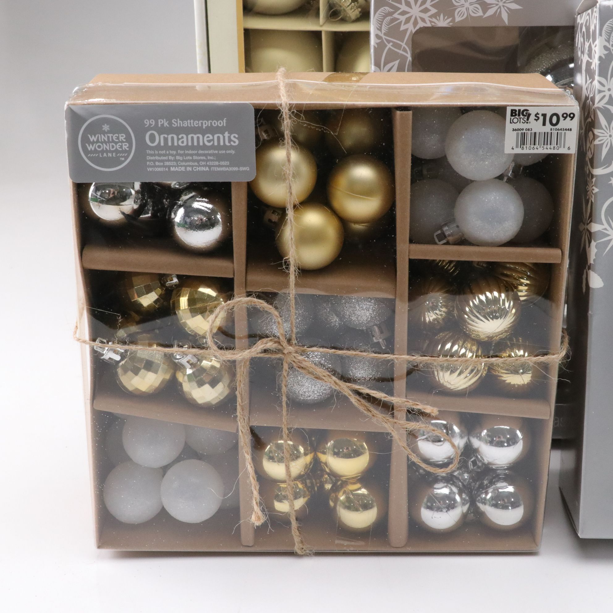 Assorted Glitter and Glass Ornaments in Silver, Gold and Blue Hues