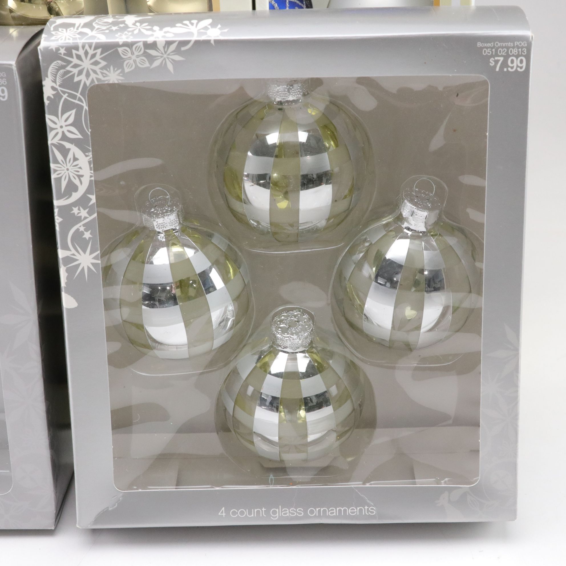 Assorted Glitter and Glass Ornaments in Silver, Gold and Blue Hues