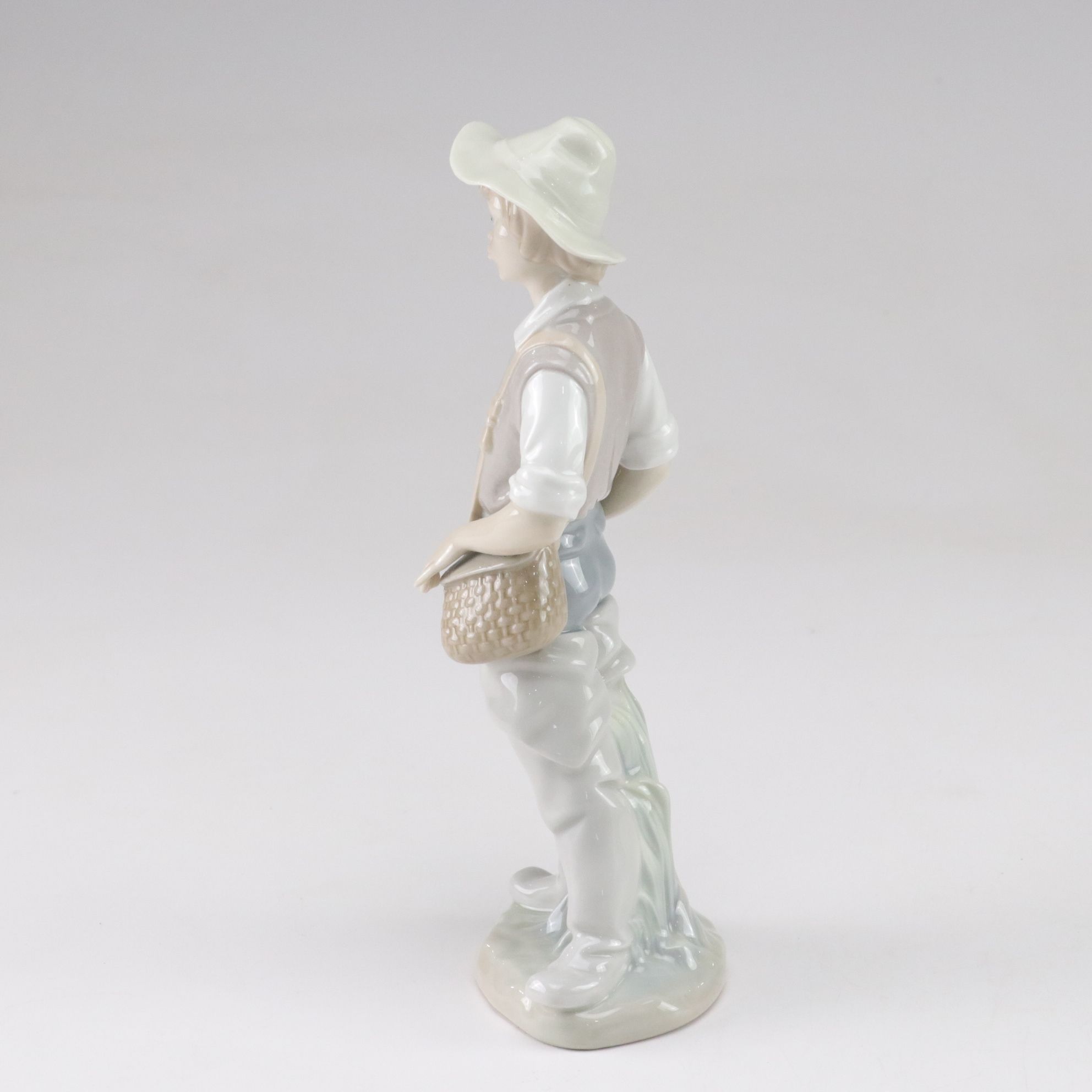 Lladró "Going Fishing," "Boy with Yacht," and "Geese" Porcelain Figurines, 1970s