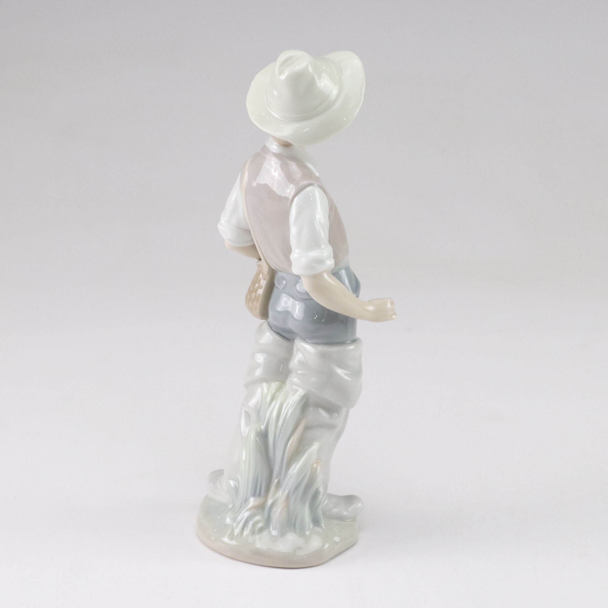 Lladró "Going Fishing," "Boy with Yacht," and "Geese" Porcelain Figurines, 1970s