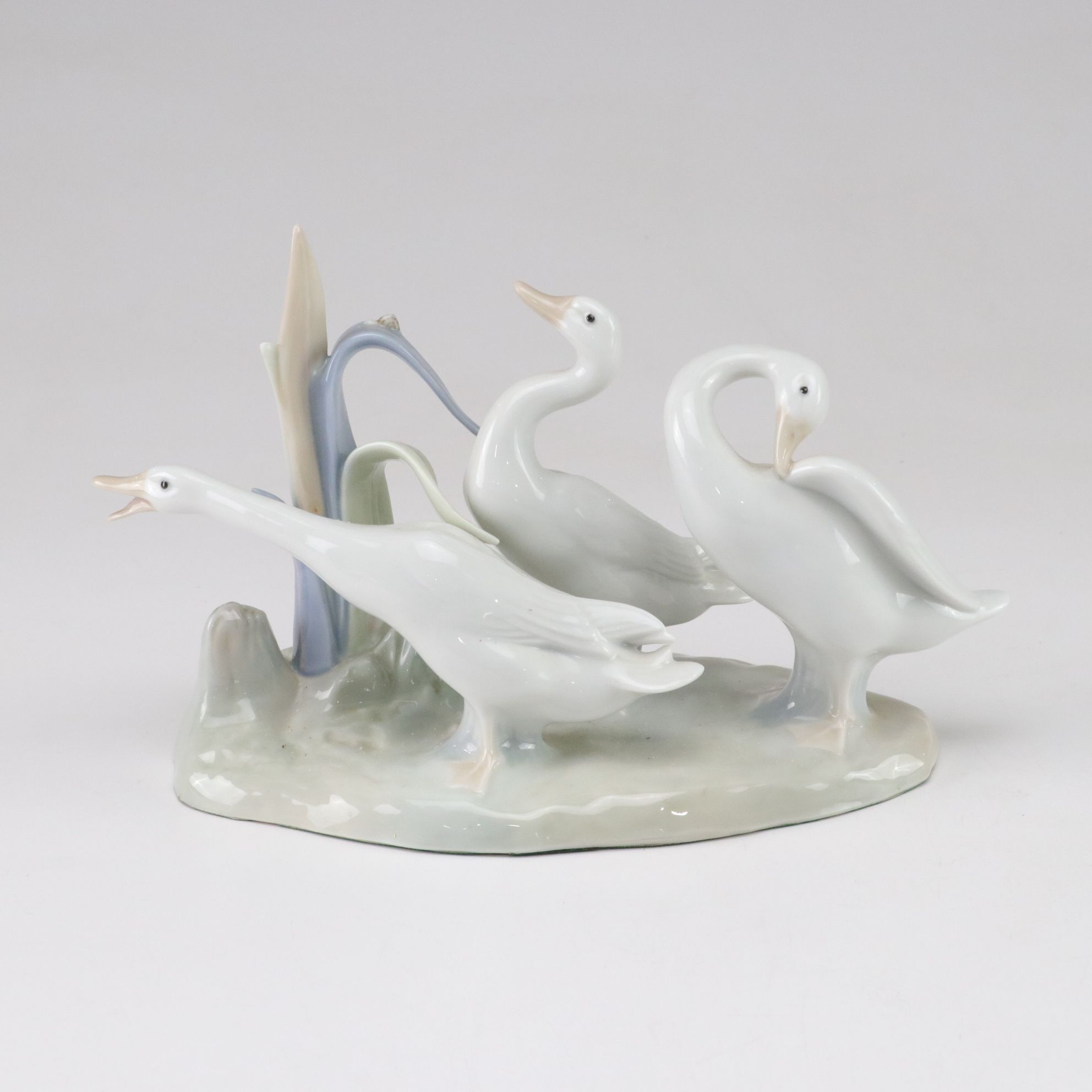 Lladró "Going Fishing," "Boy with Yacht," and "Geese" Porcelain Figurines, 1970s