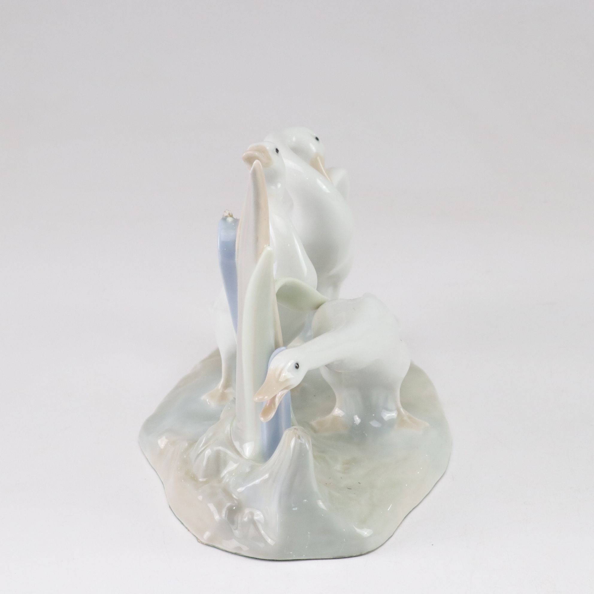 Lladró "Going Fishing," "Boy with Yacht," and "Geese" Porcelain Figurines, 1970s