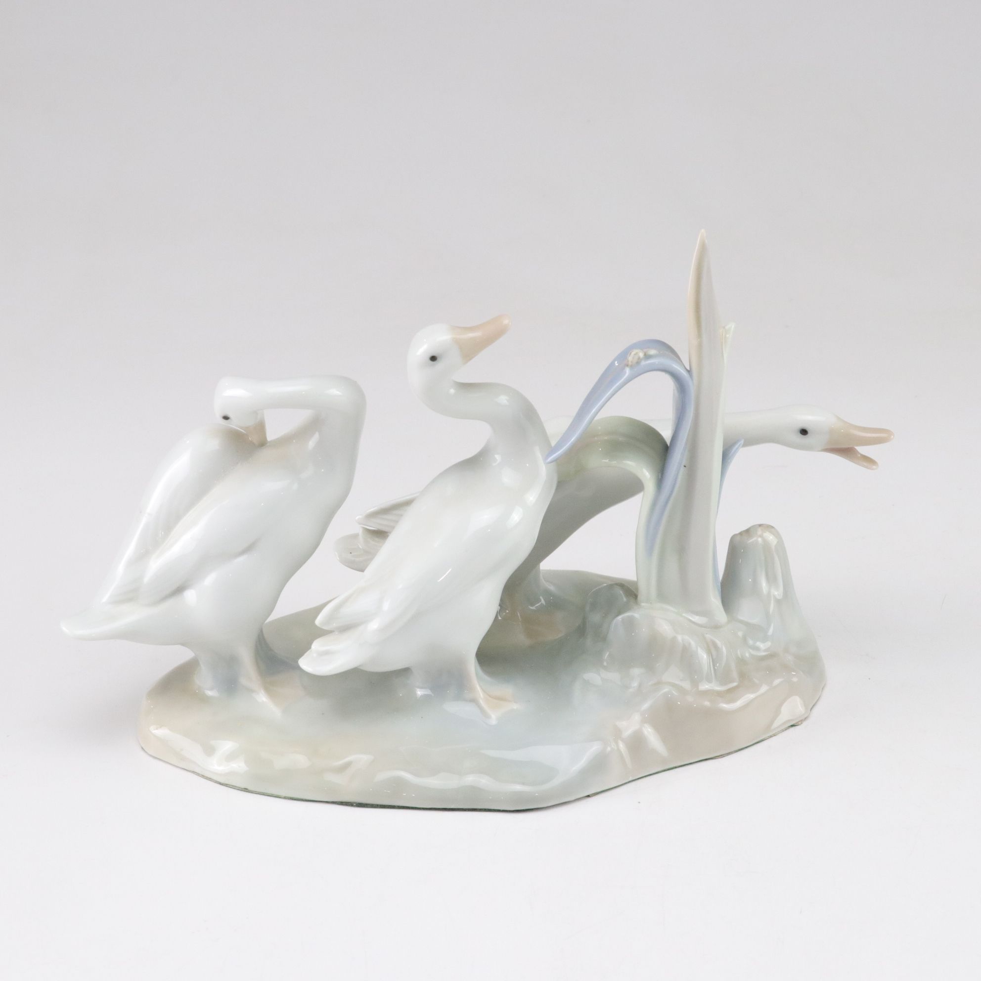 Lladró "Going Fishing," "Boy with Yacht," and "Geese" Porcelain Figurines, 1970s