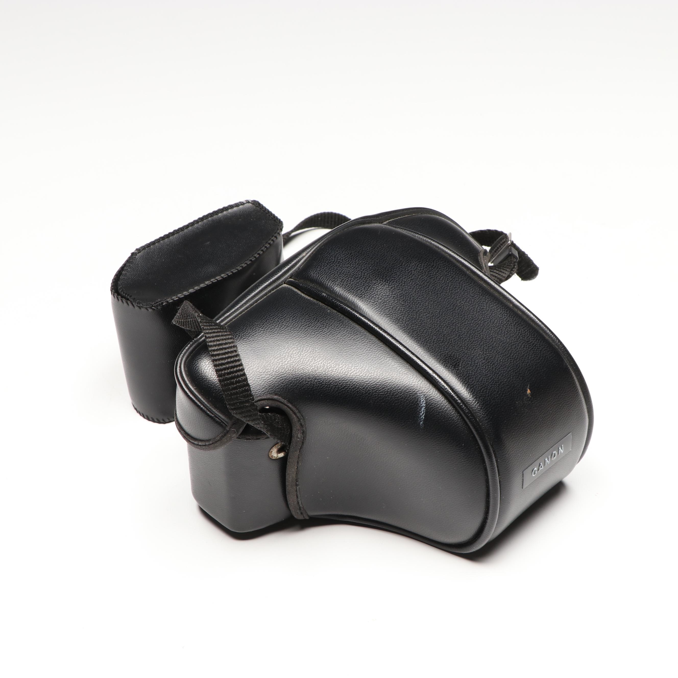 Canon T50 35mm Camera with Toyo Optics Lens, Flash and Cases