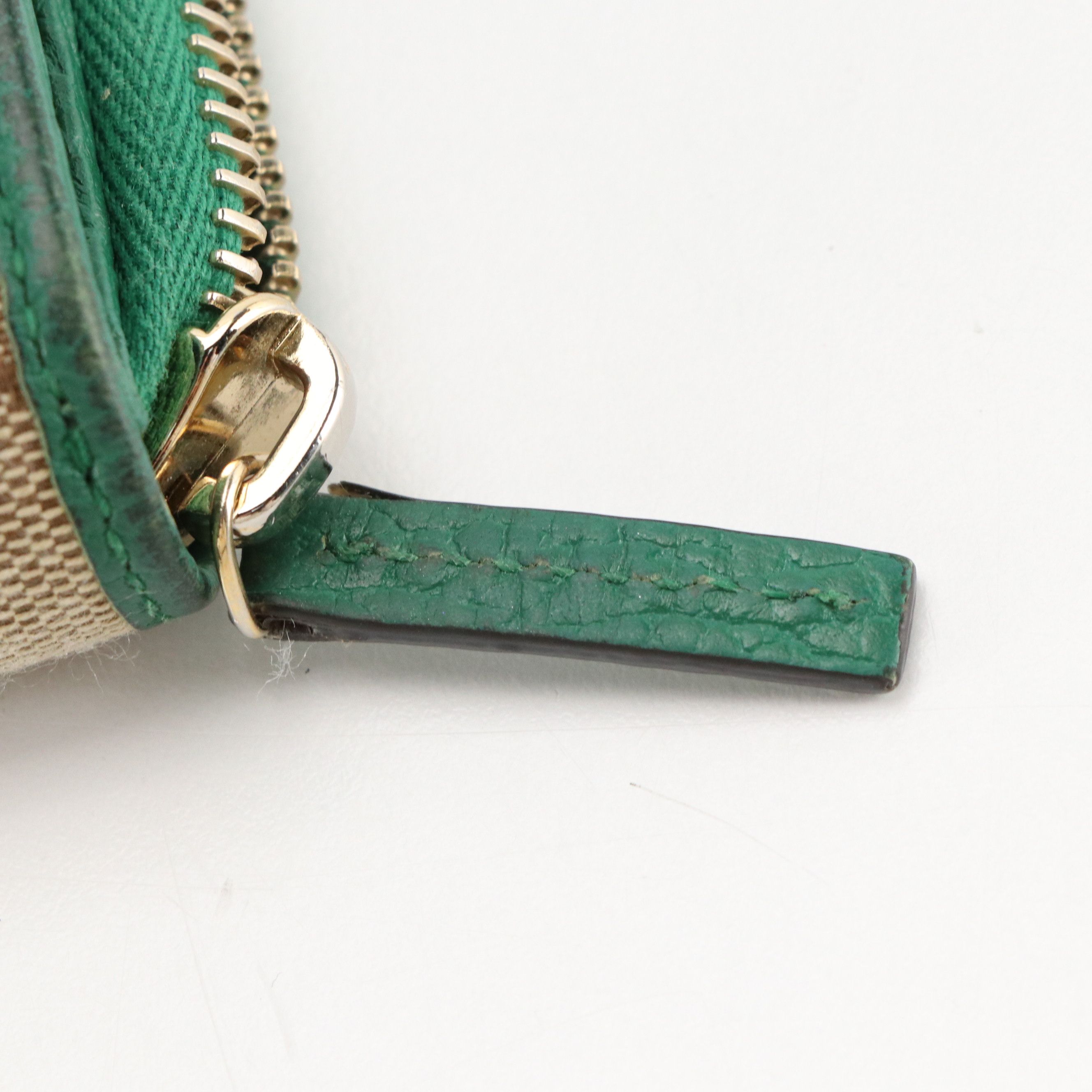 Gucci Compact Bifold Zip Wallet in GG Canvas and Green Calfskin Leather