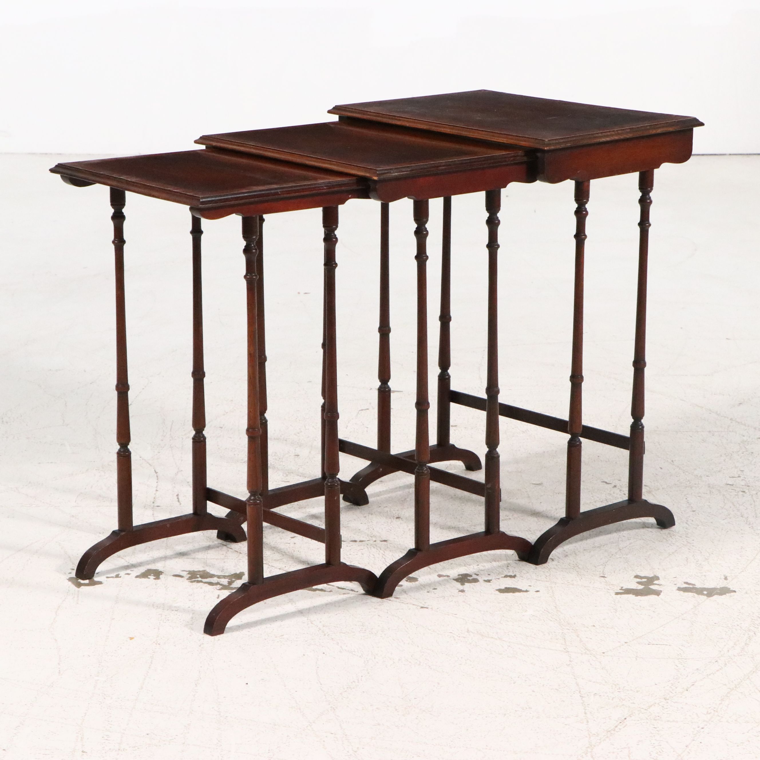 Set of Three Sheraton Style Mahogany Finish Nesting Tables, 20th Century