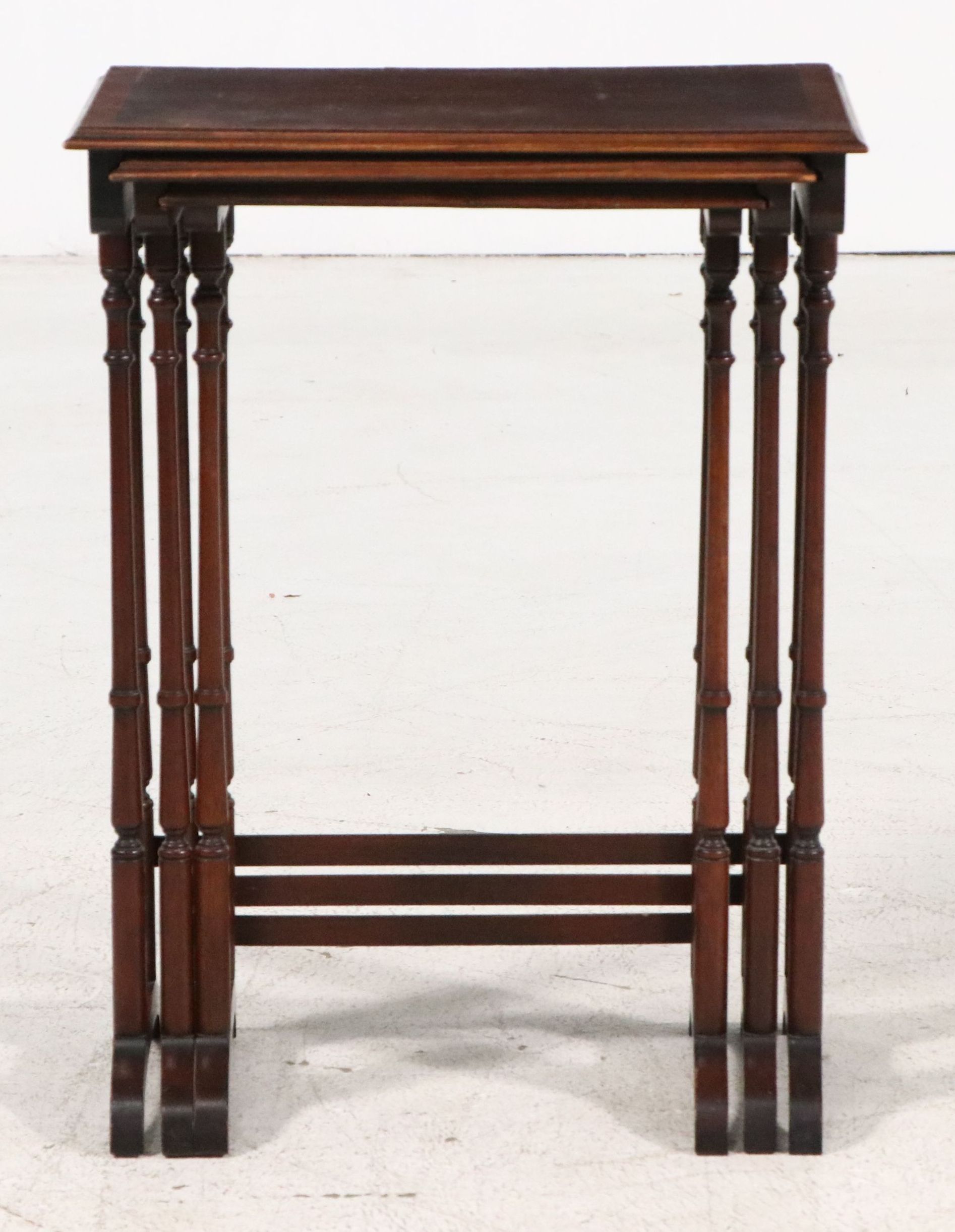 Set of Three Sheraton Style Mahogany Finish Nesting Tables, 20th Century