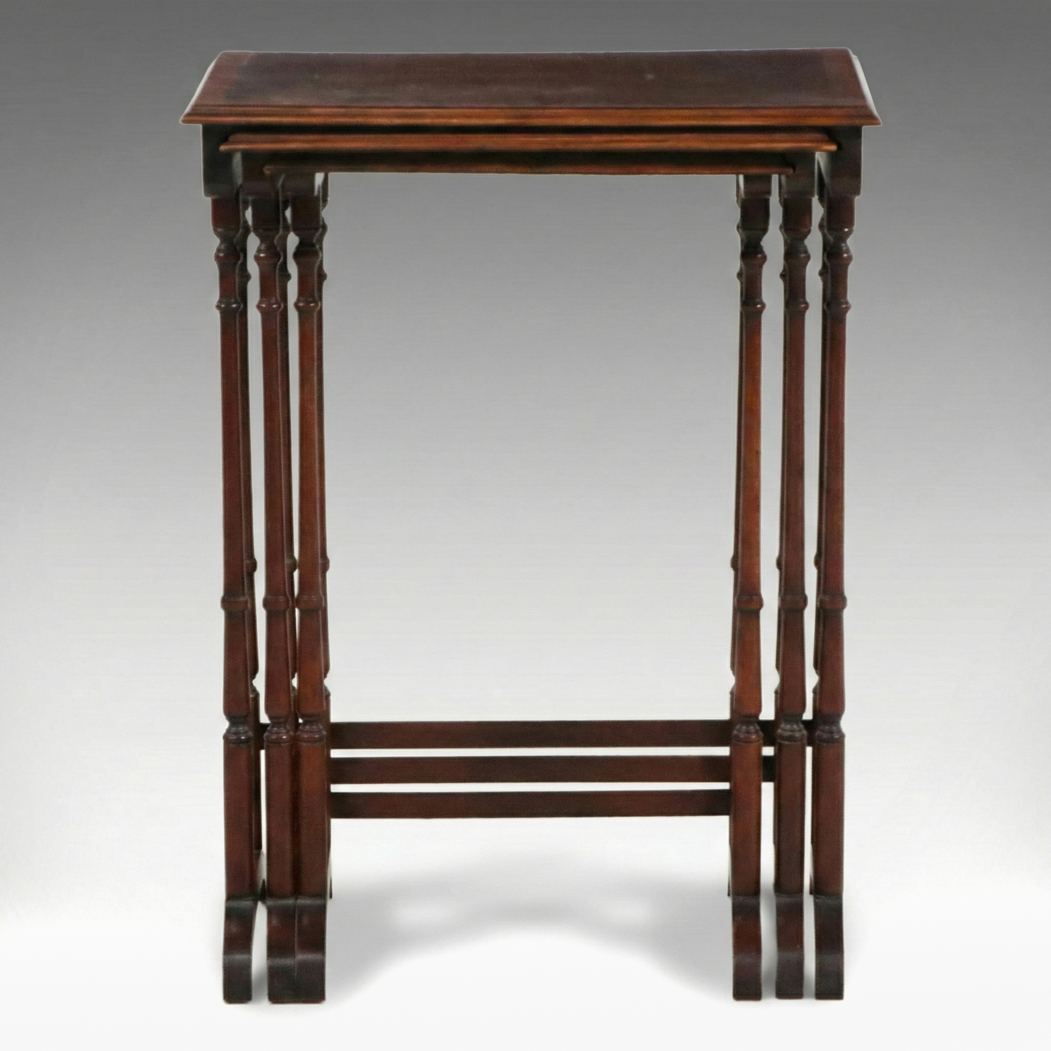Set of Three Sheraton Style Mahogany Finish Nesting Tables, 20th Century