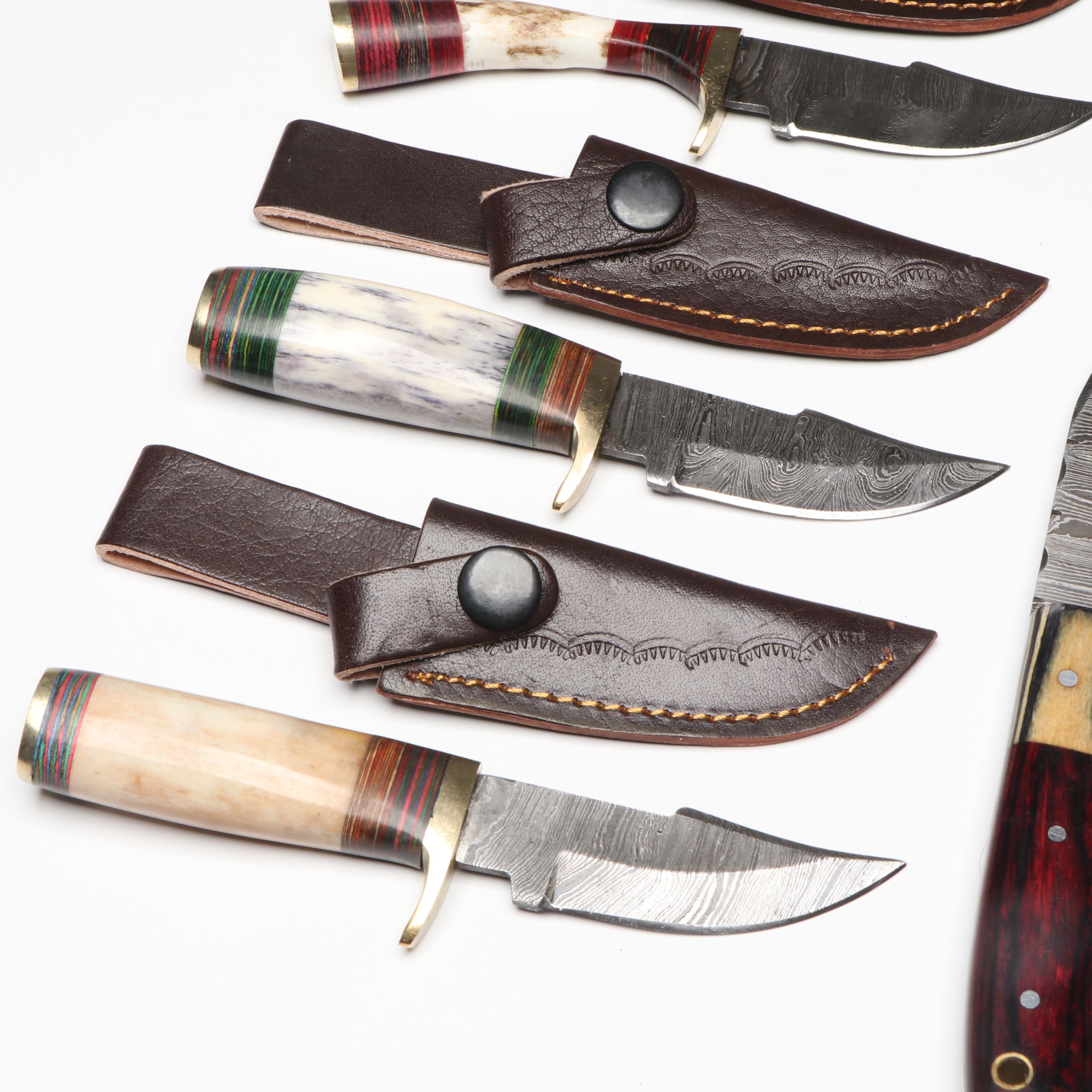 Damascus Steel Skinner and Hunting Knives in Leather Scabbards
