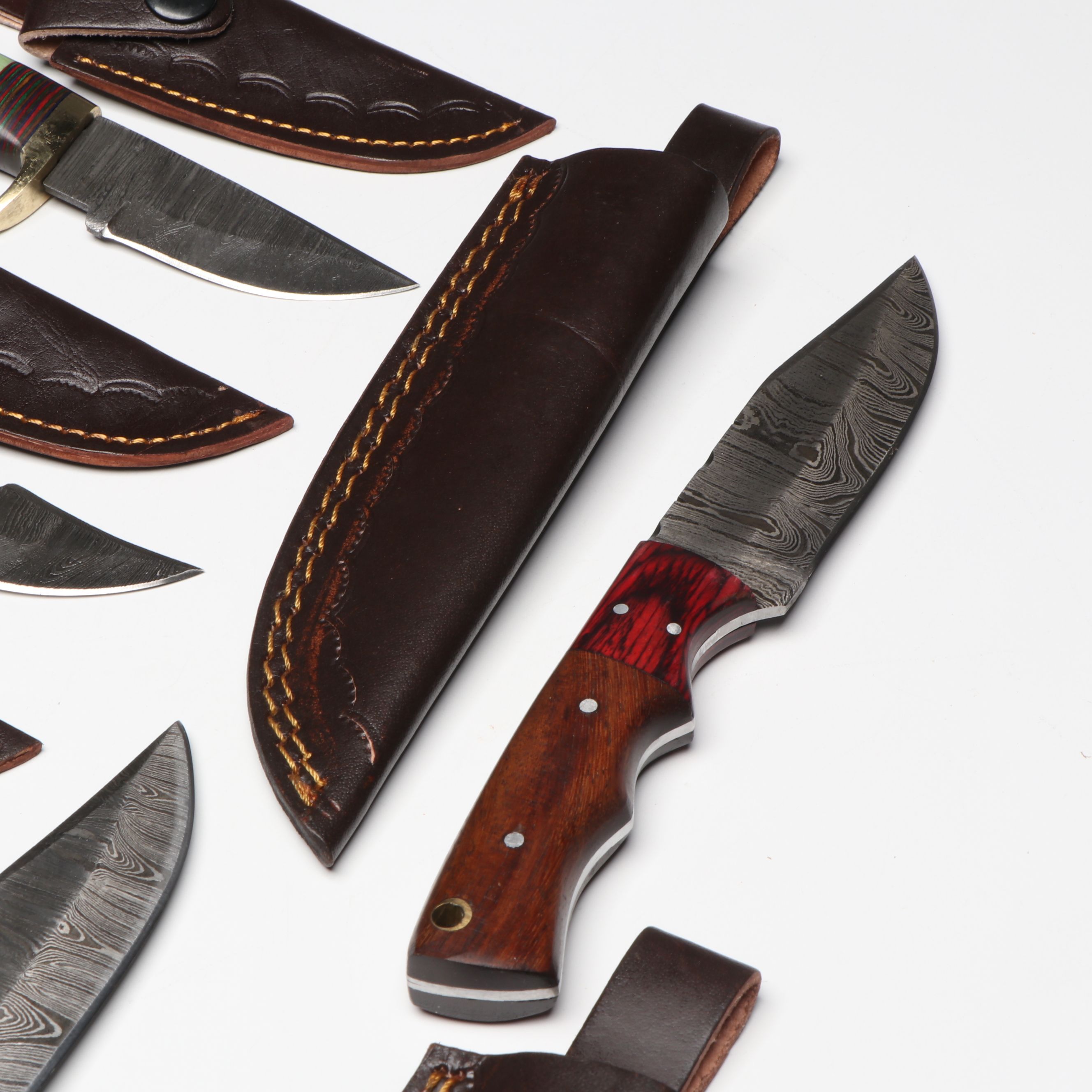 Damascus Steel Skinner and Hunting Knives in Leather Scabbards