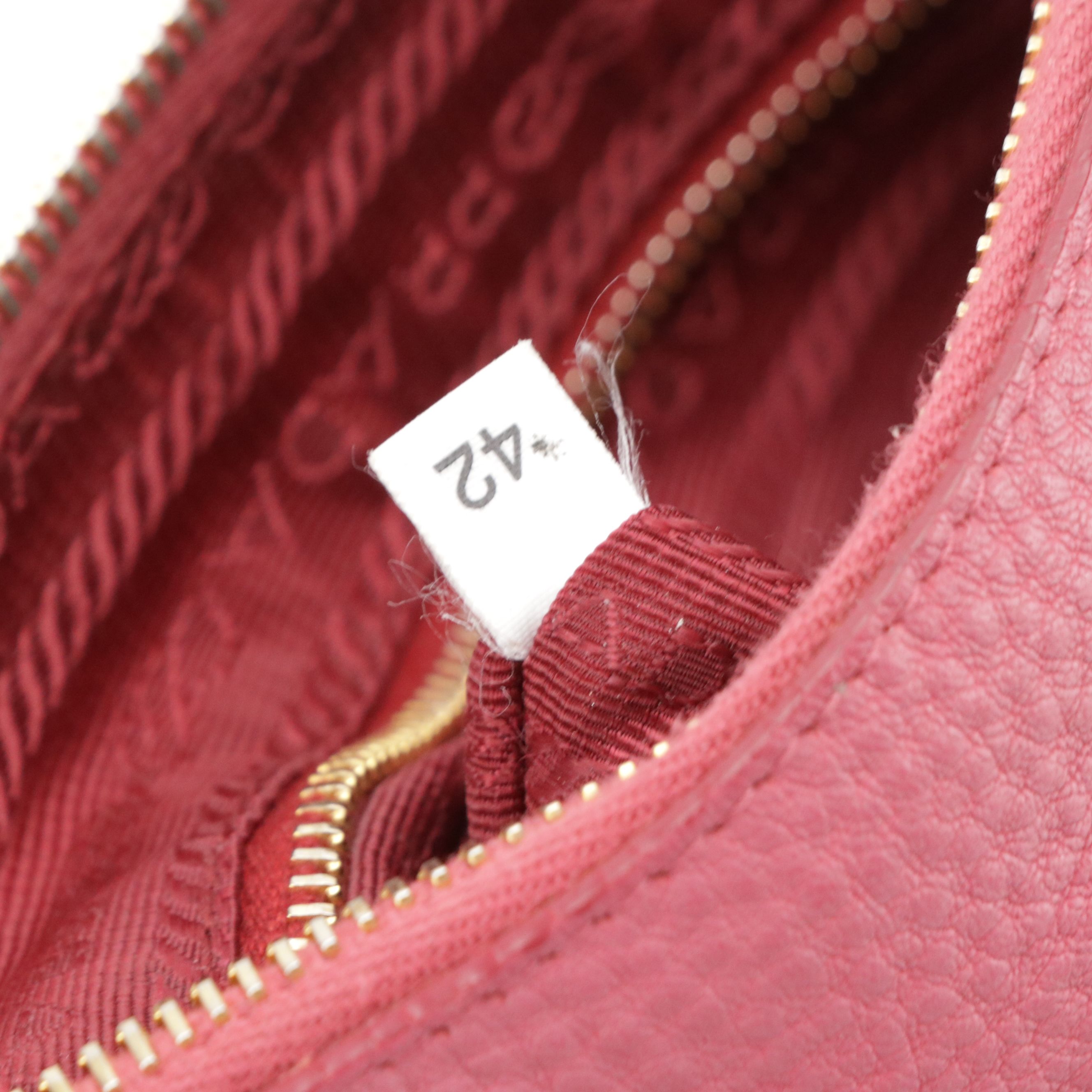 Prada Mini Zippered Shoulder Bag in Pink Vitello Daino Leather