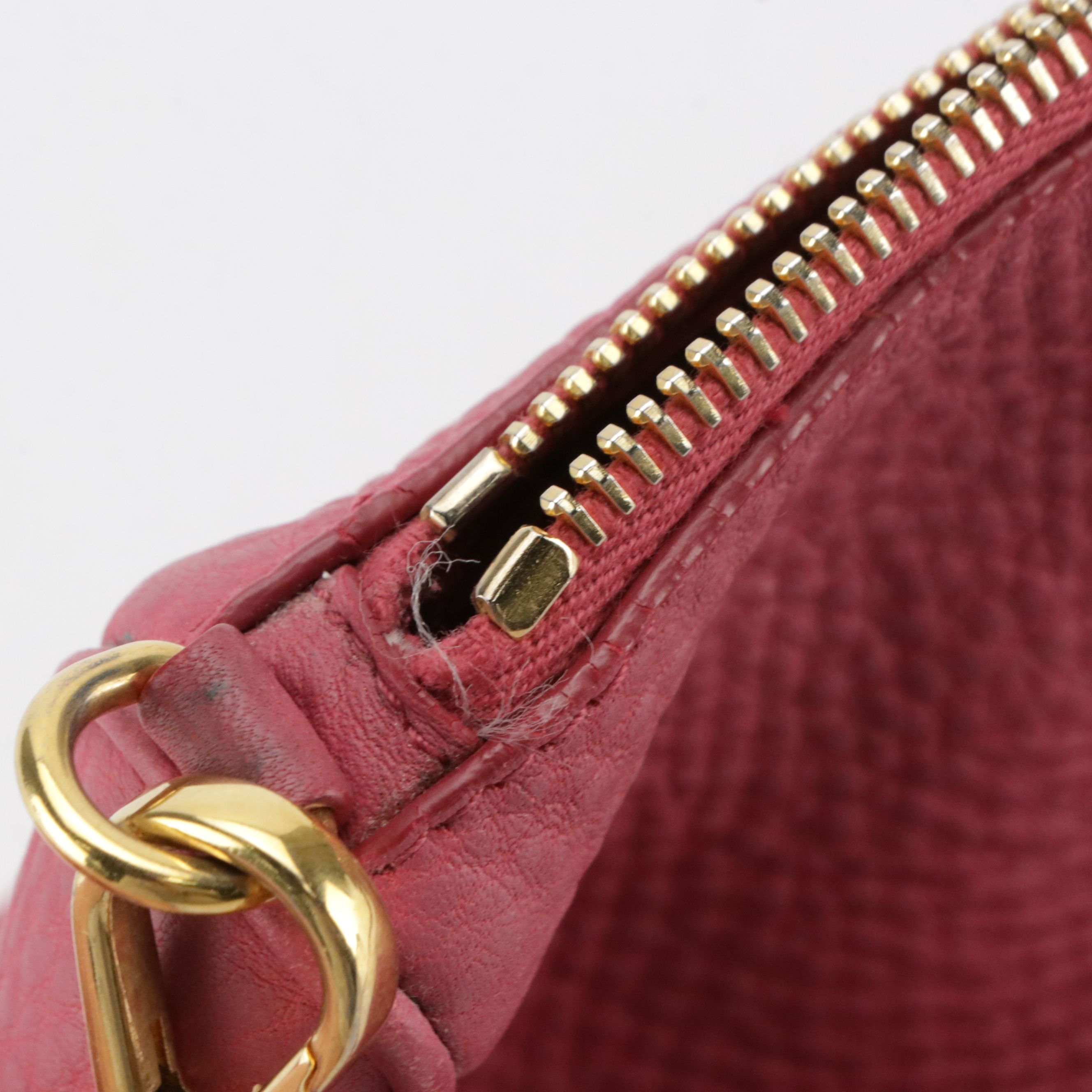 Prada Mini Zippered Shoulder Bag in Pink Vitello Daino Leather