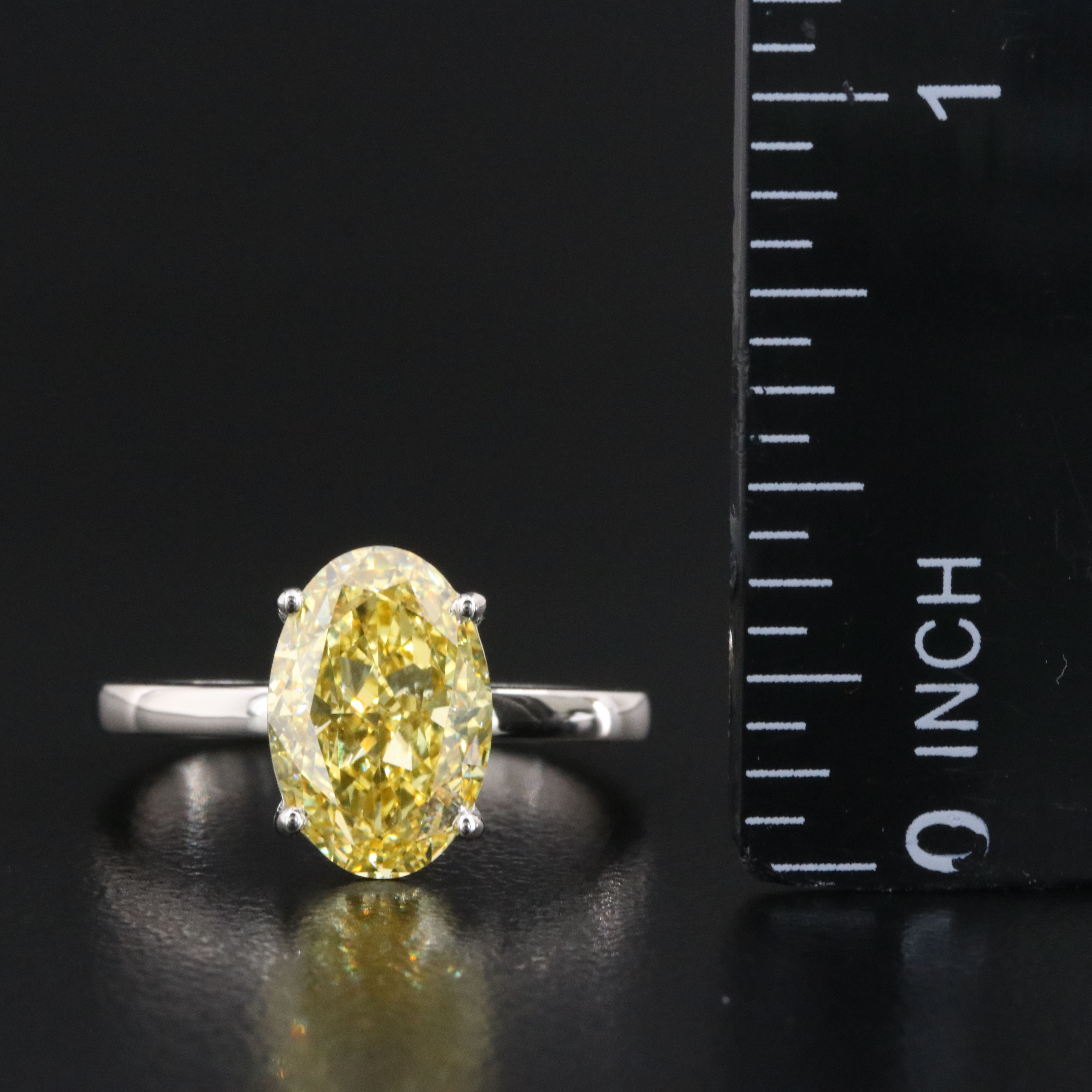 Platinum 3.07 CT Lab Grown Fancy Vivid Yellow Diamond Ring with IGI Report