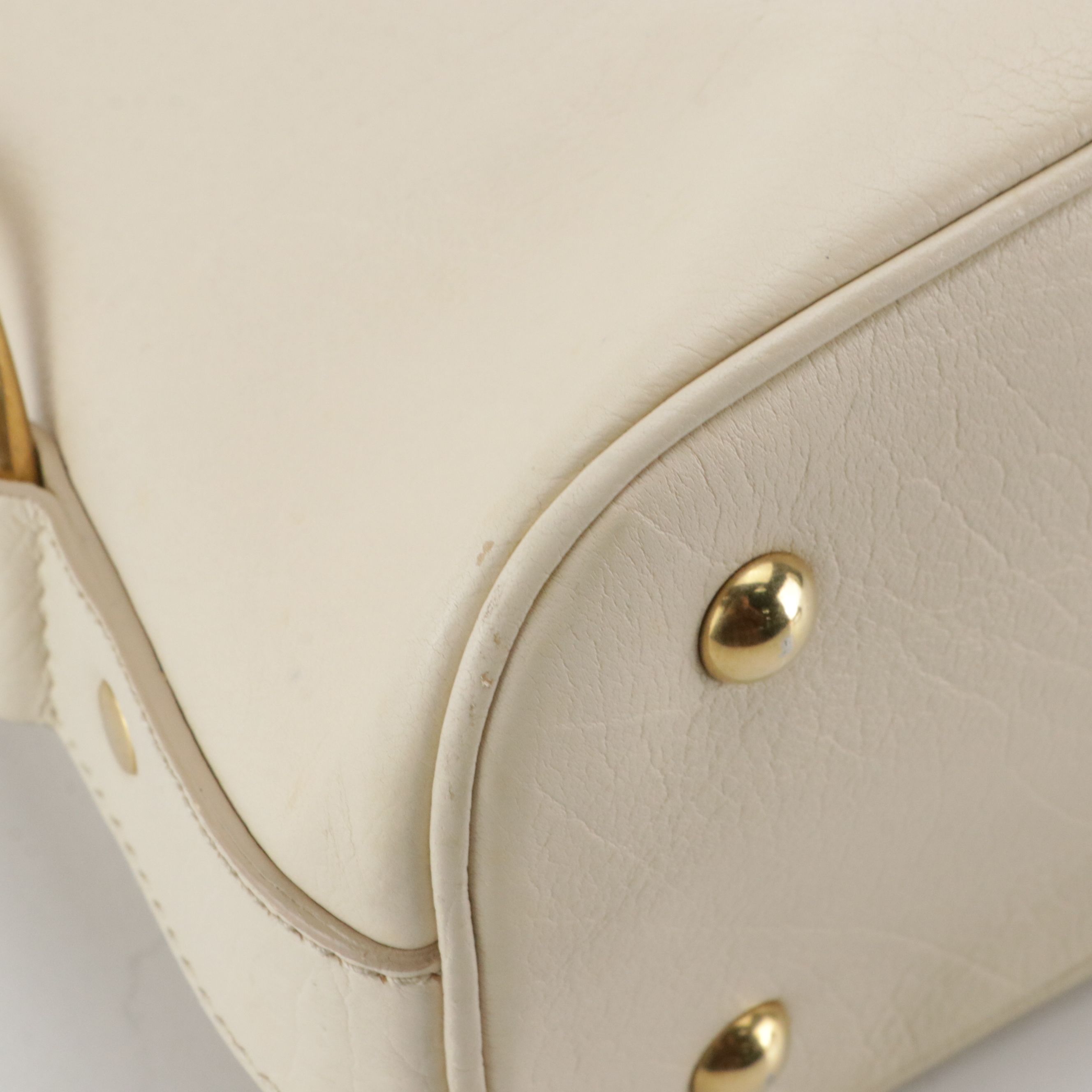 Yves Saint Laurent Domed Muse Handbag in Ivory Calfskin Leather