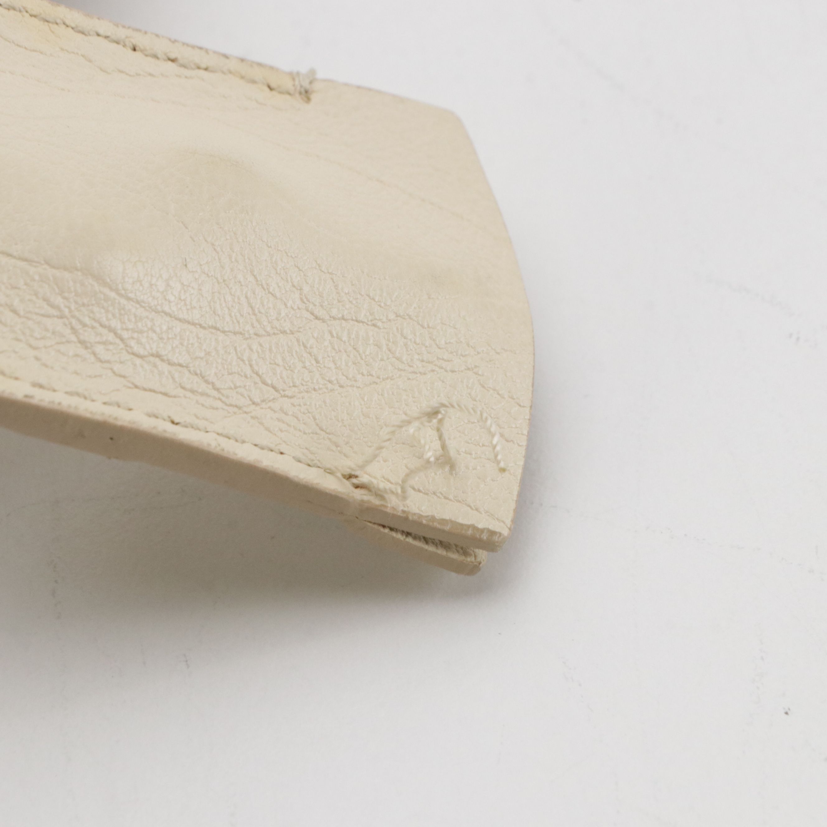 Yves Saint Laurent Domed Muse Handbag in Ivory Calfskin Leather