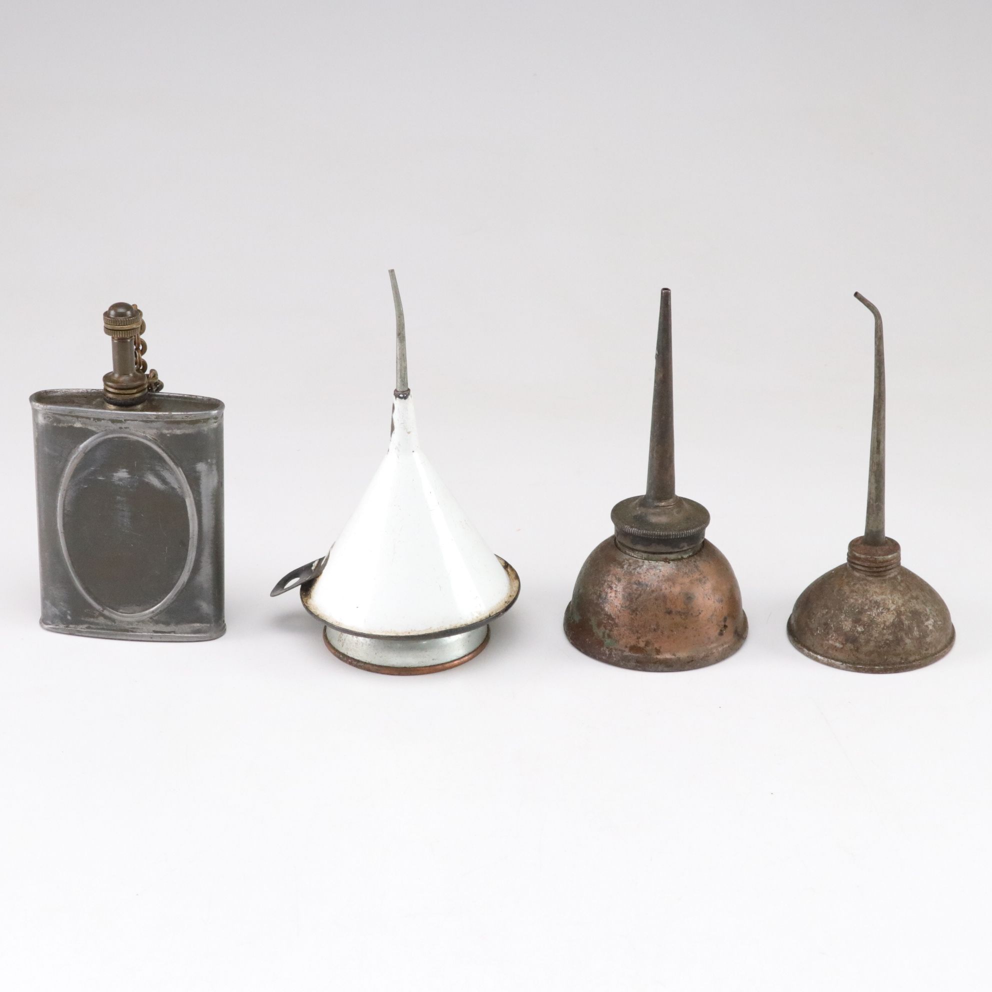 WWII Era Gun Oil Can with Other Oil Cans and Grinding Wheel, Mid-20th Century