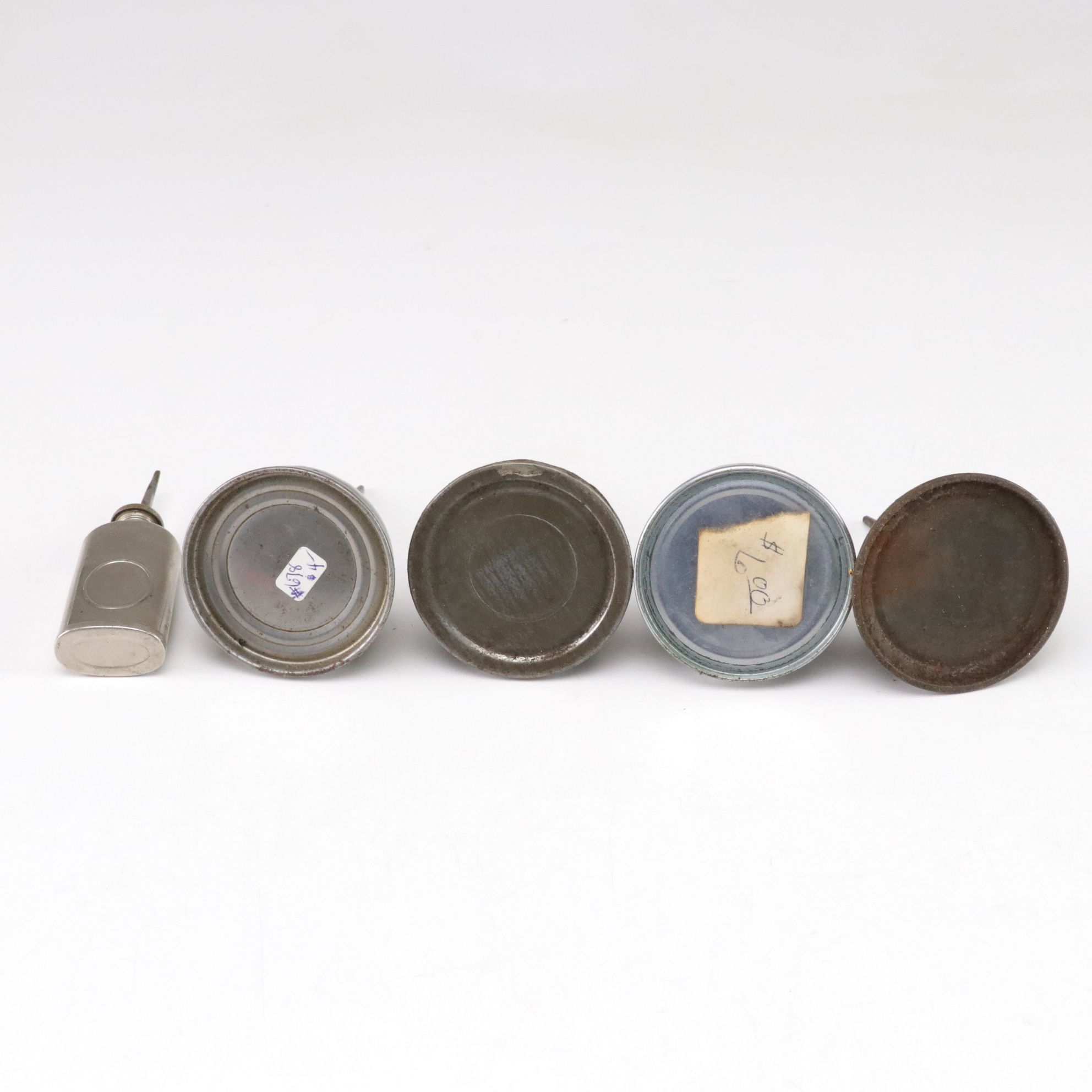 WWII Era Gun Oil Can with Other Oil Cans and Grinding Wheel, Mid-20th Century