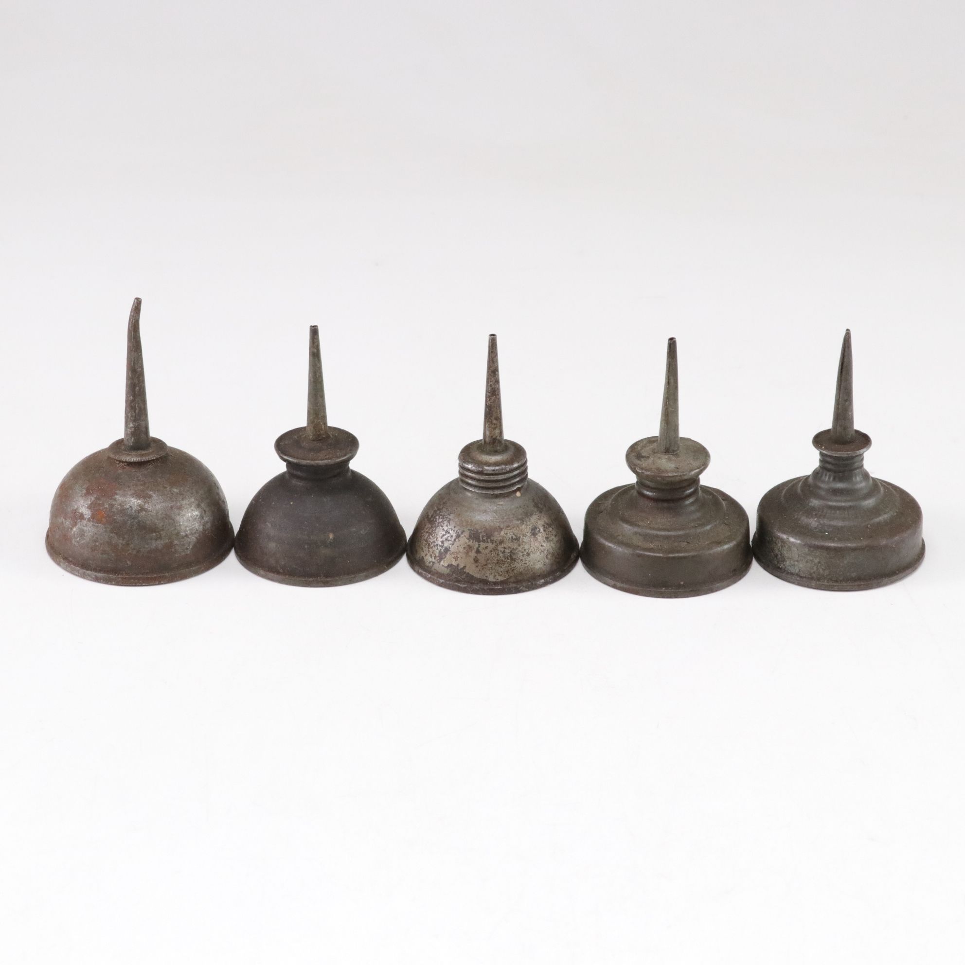 WWII Era Gun Oil Can with Other Oil Cans and Grinding Wheel, Mid-20th Century