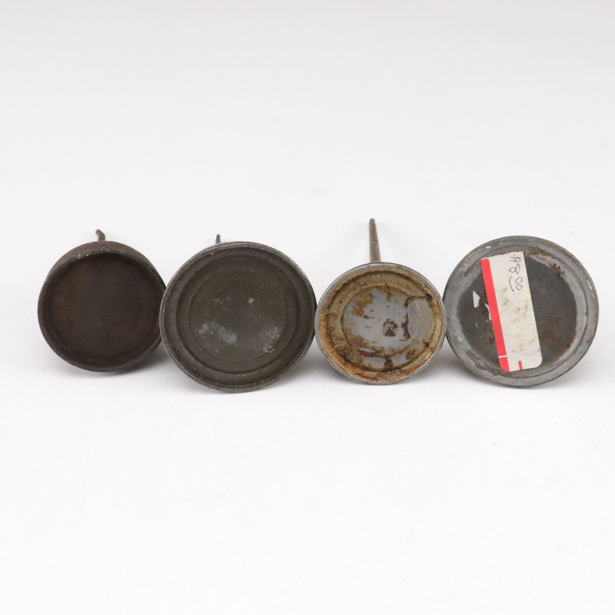 WWII Era Gun Oil Can with Other Oil Cans and Grinding Wheel, Mid-20th Century