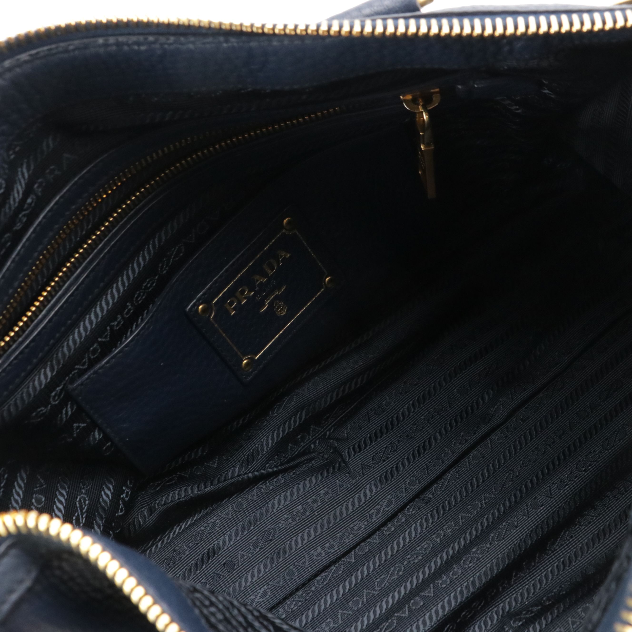 Prada Front Zip Top Handle Two-Way Bag in Dark Blue Vitello Daino Leather