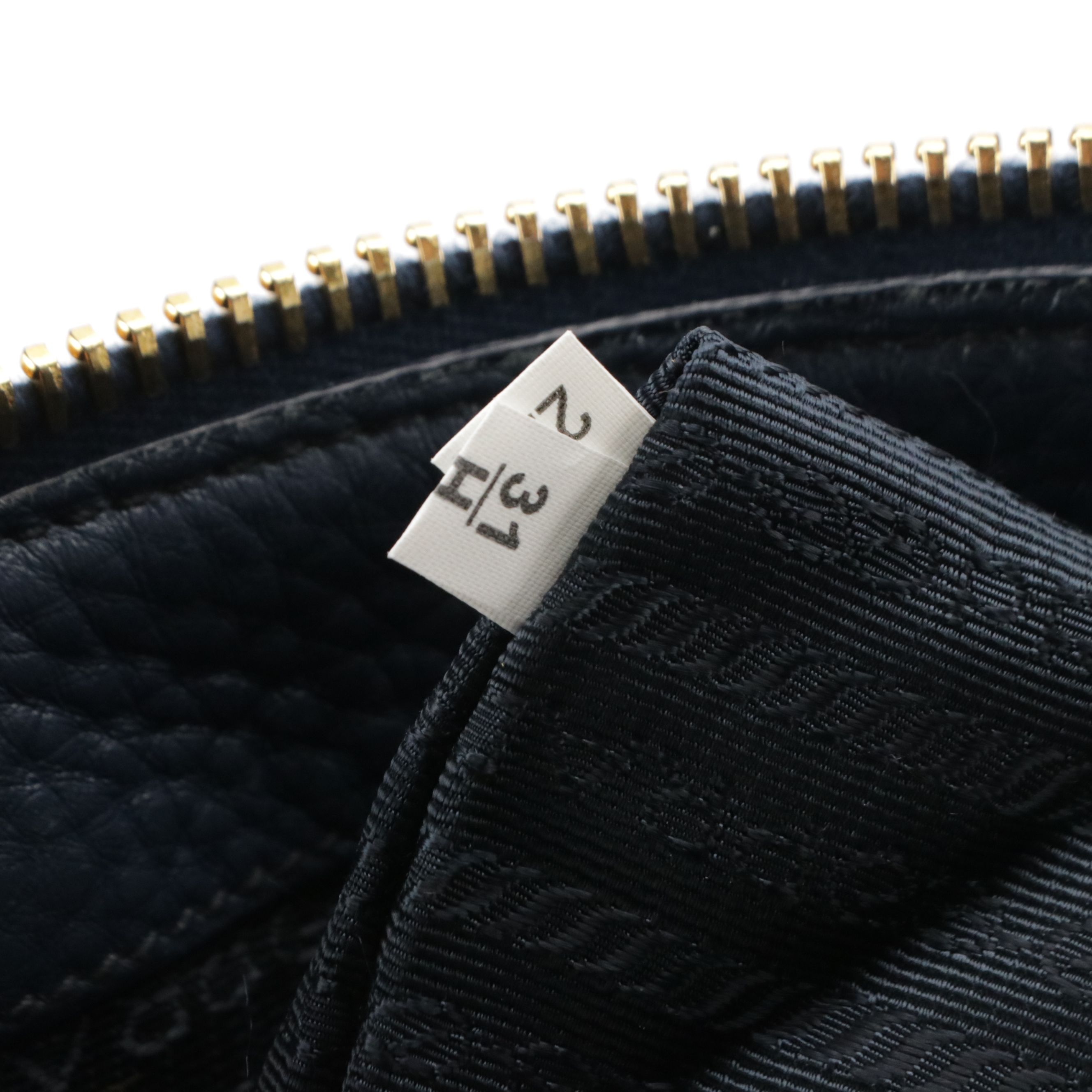 Prada Front Zip Top Handle Two-Way Bag in Dark Blue Vitello Daino Leather