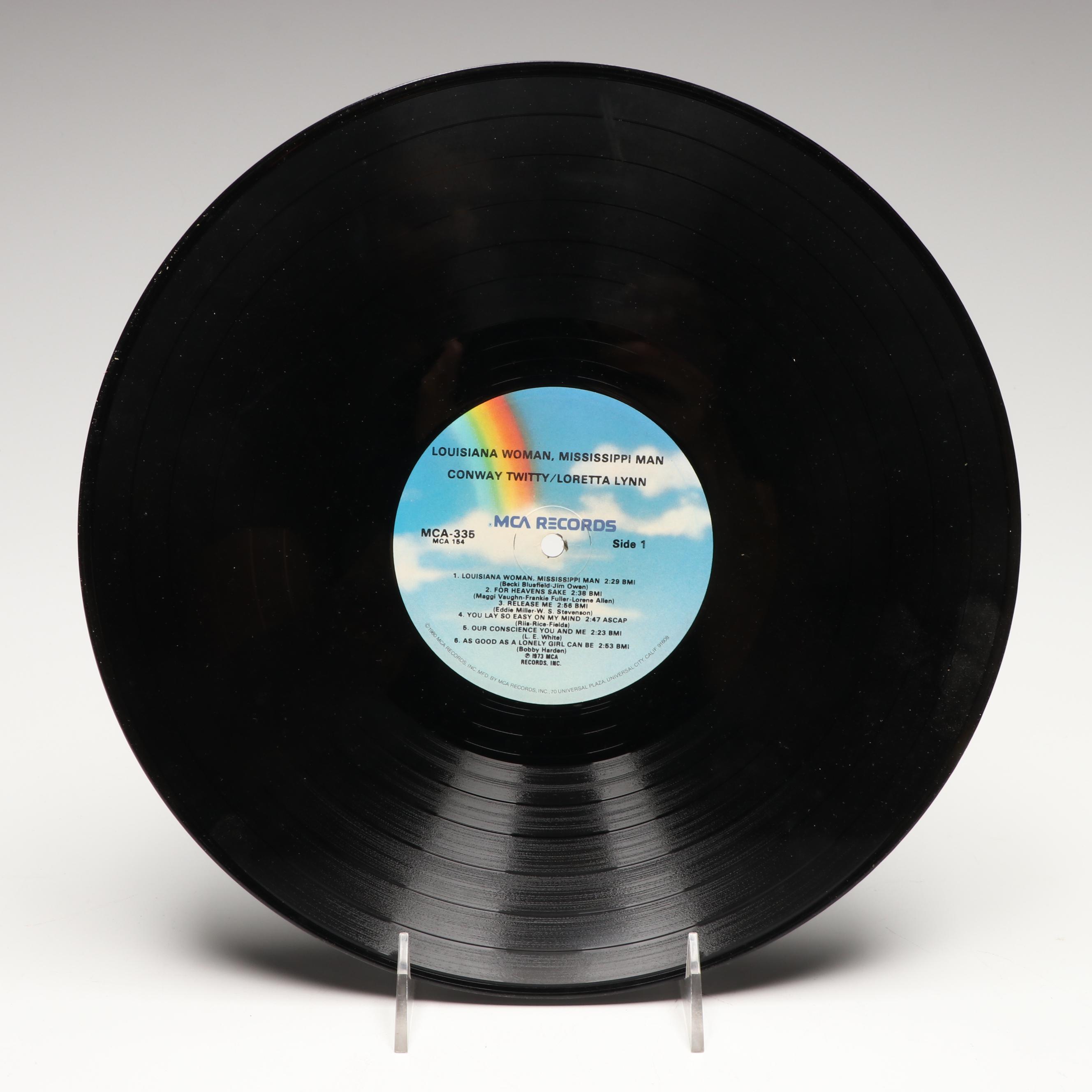 Dolly Parton, Loretta Lynn, Lenny Dee, and More Vinyl Record Albums