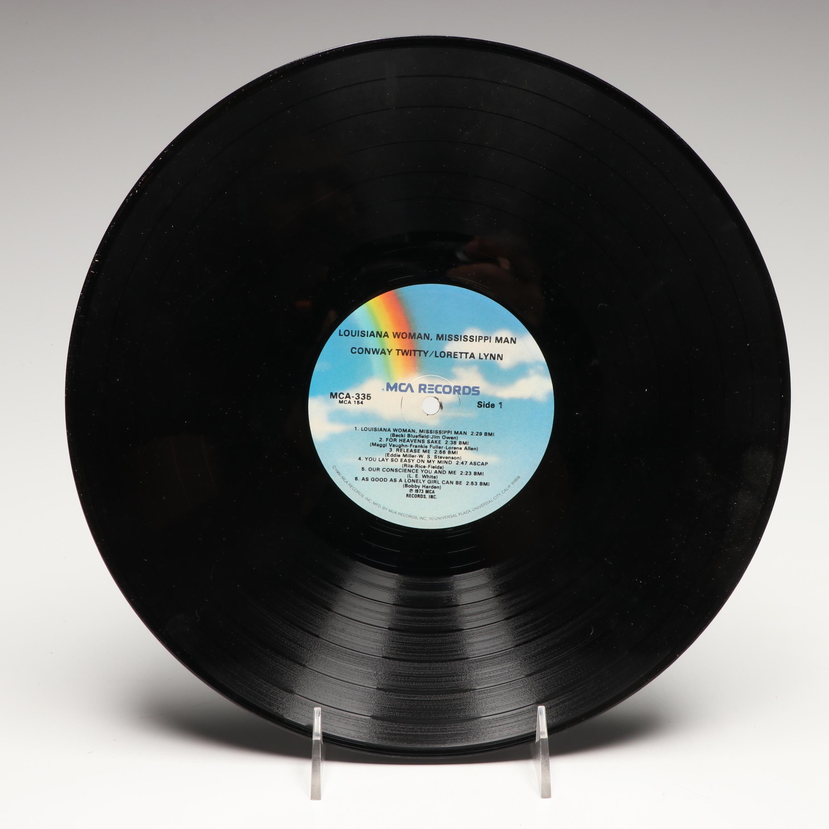 Dolly Parton, Loretta Lynn, Lenny Dee, and More Vinyl Record Albums