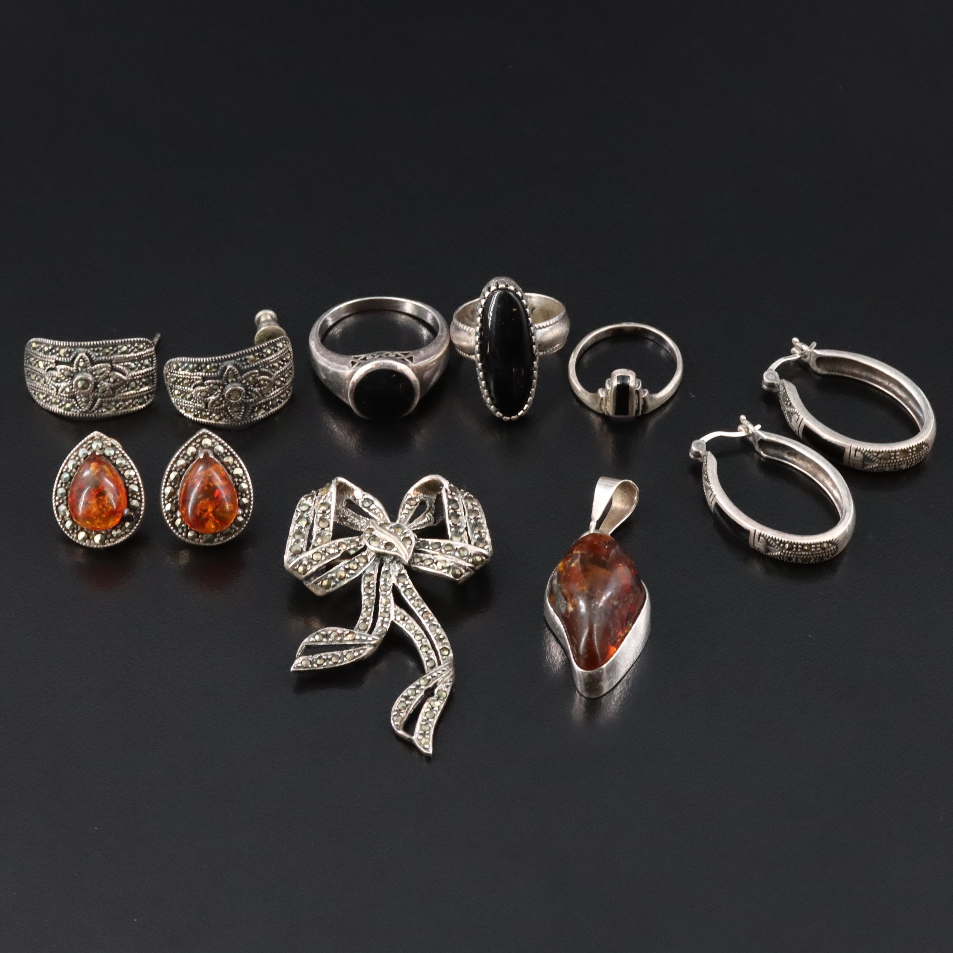 Amber, Black Onyx and Marcasite Featured in Sterling Jewelry