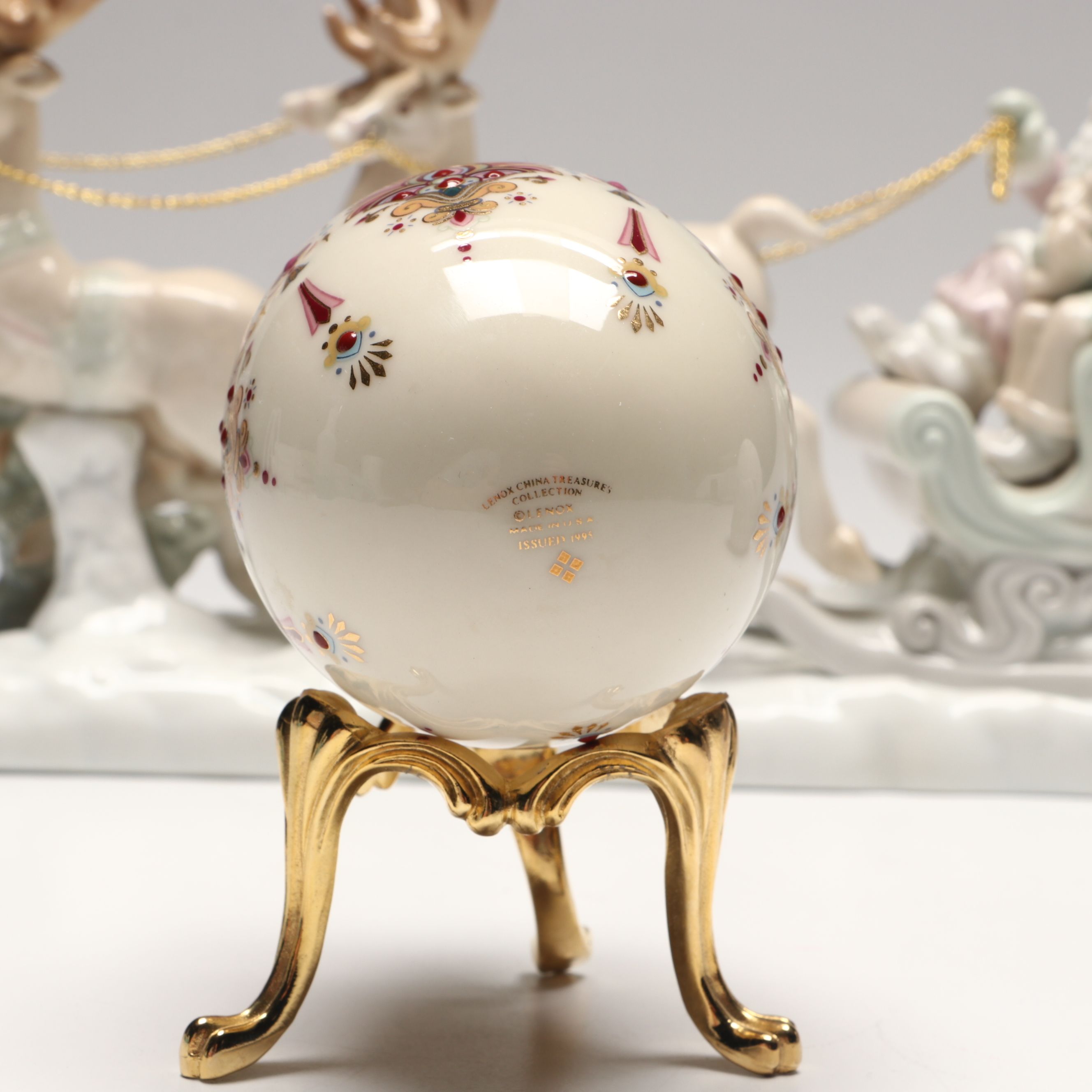 Lenox "Ruby" and Lladró Porcelain Eggs with Russ Santa's Sleigh Figurine