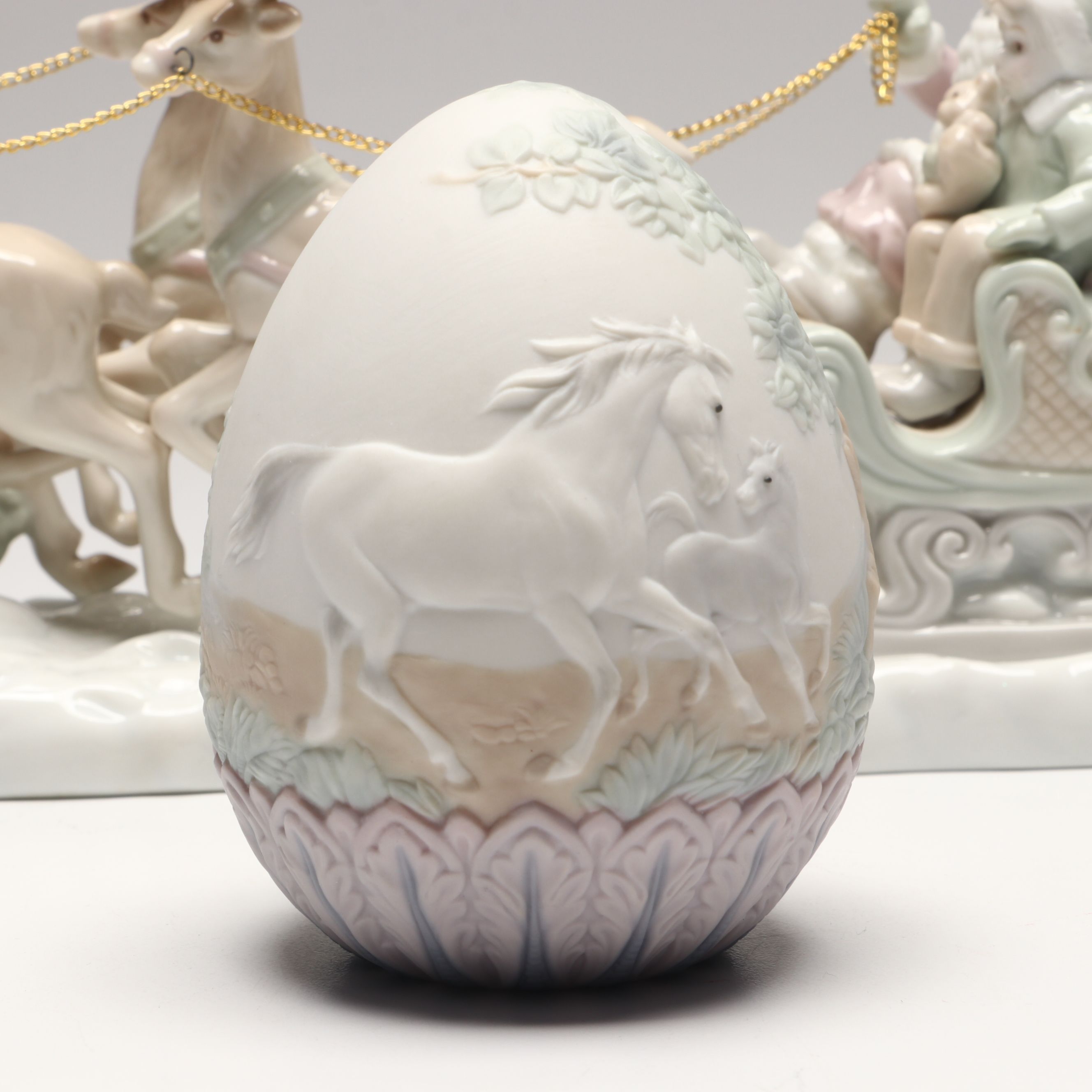 Lenox "Ruby" and Lladró Porcelain Eggs with Russ Santa's Sleigh Figurine