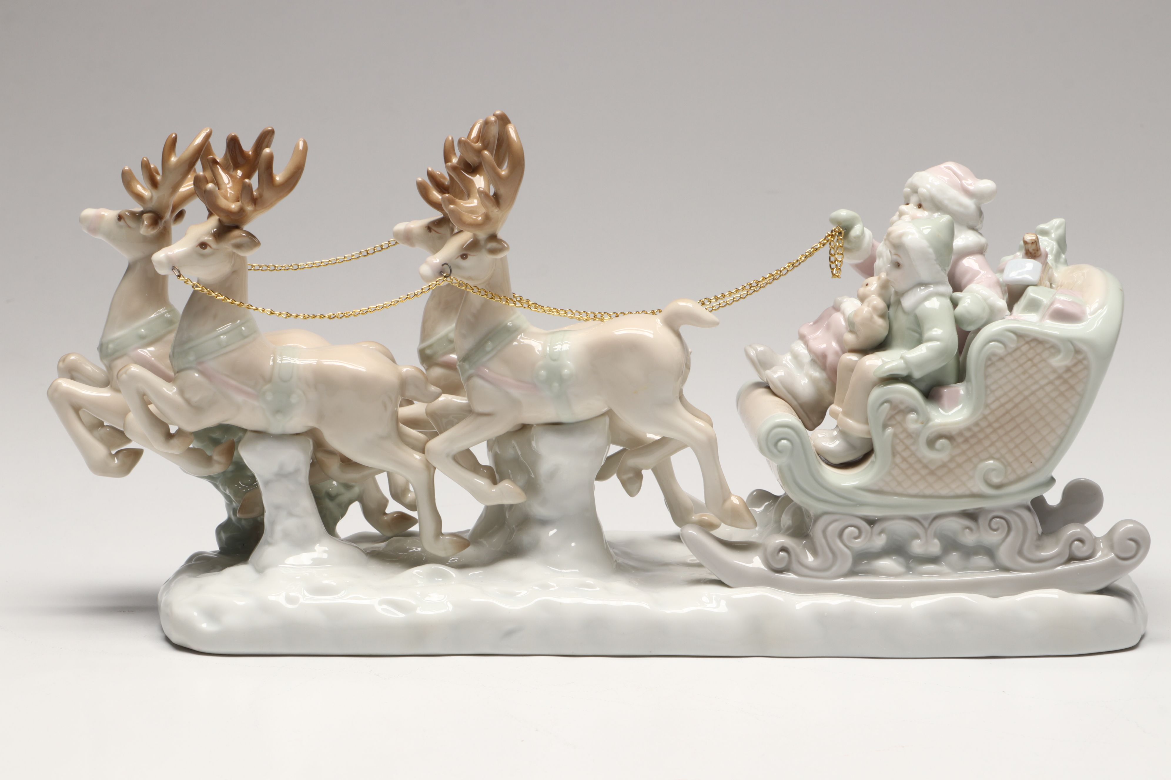 Lenox "Ruby" and Lladró Porcelain Eggs with Russ Santa's Sleigh Figurine