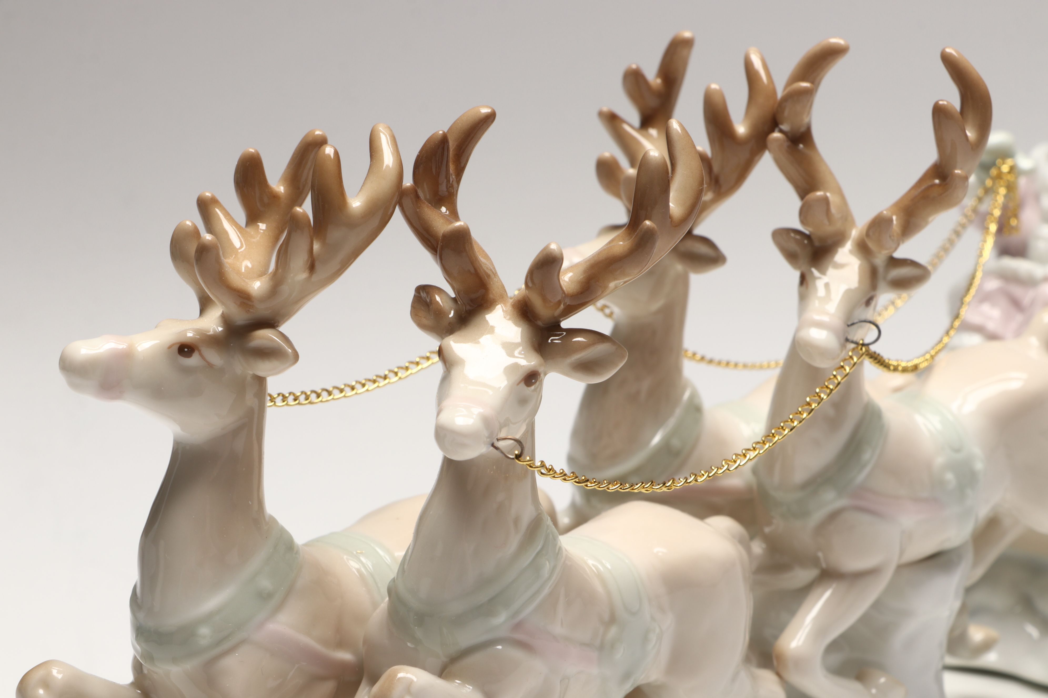 Lenox "Ruby" and Lladró Porcelain Eggs with Russ Santa's Sleigh Figurine