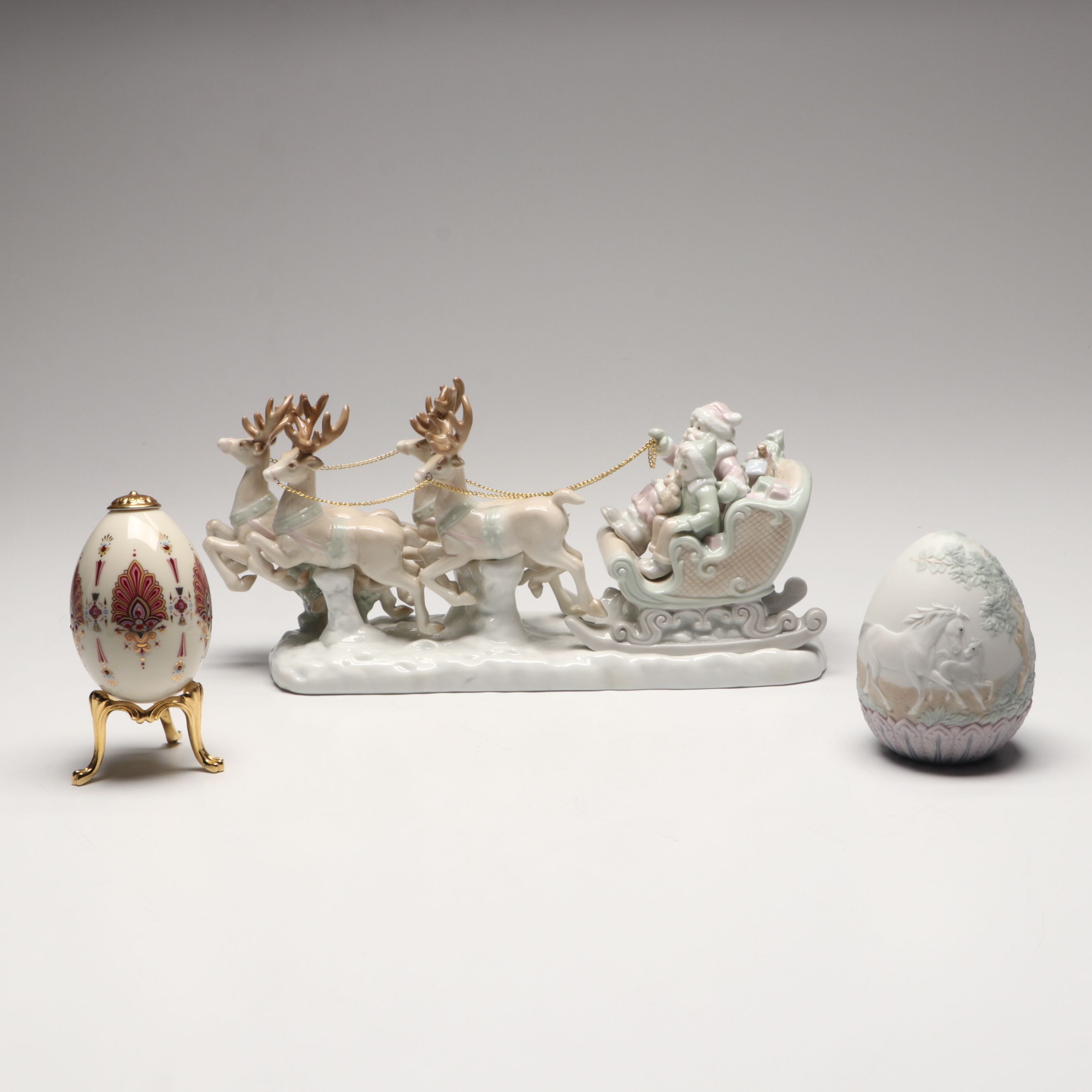 Lenox "Ruby" and Lladró Porcelain Eggs with Russ Santa's Sleigh Figurine