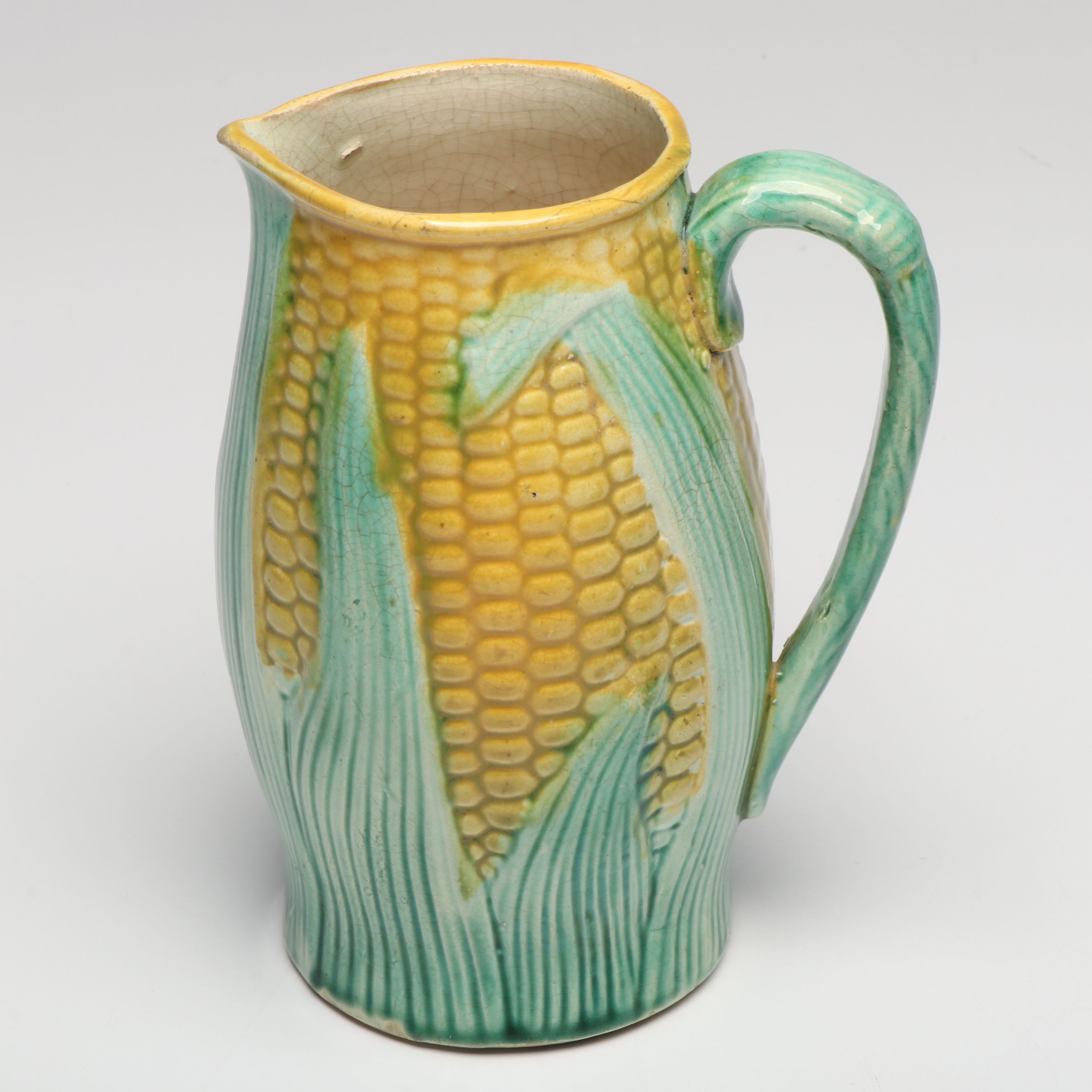 Majolica Style Corn Pitcher, Saucer and Other Table Accessories, Early 20th C.