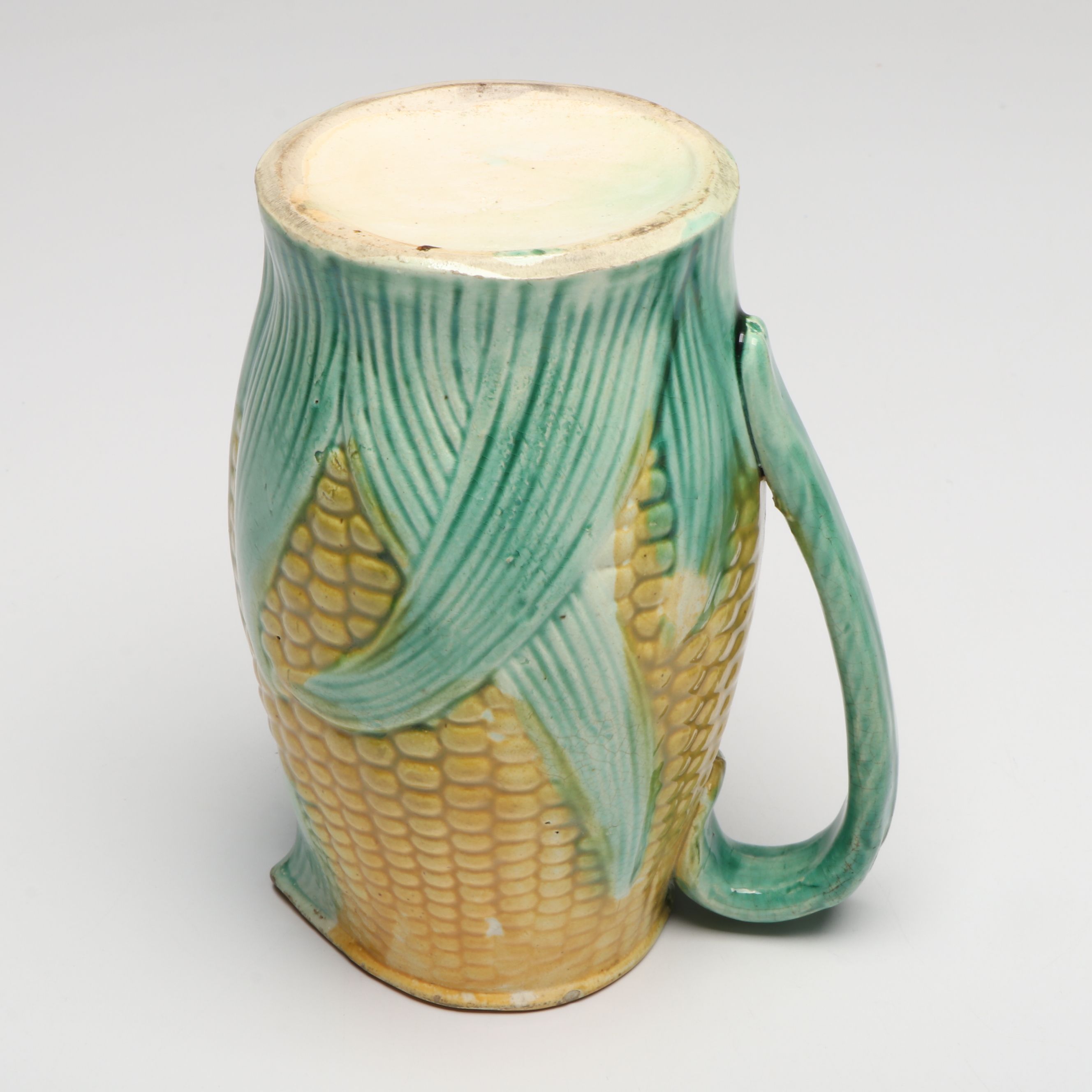 Majolica Style Corn Pitcher, Saucer and Other Table Accessories, Early 20th C.
