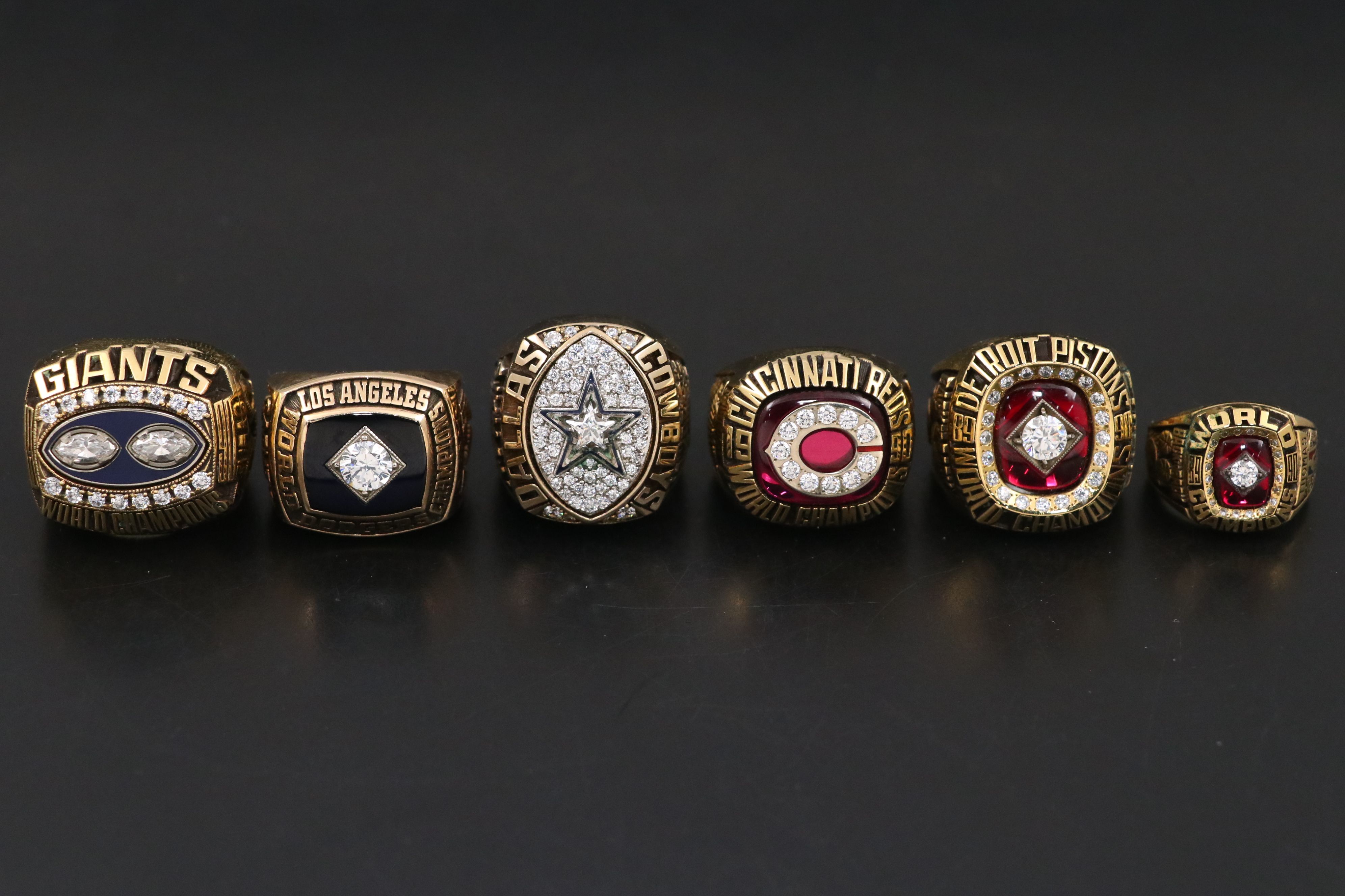 Replica Championship Rings with Sports Pins and Display