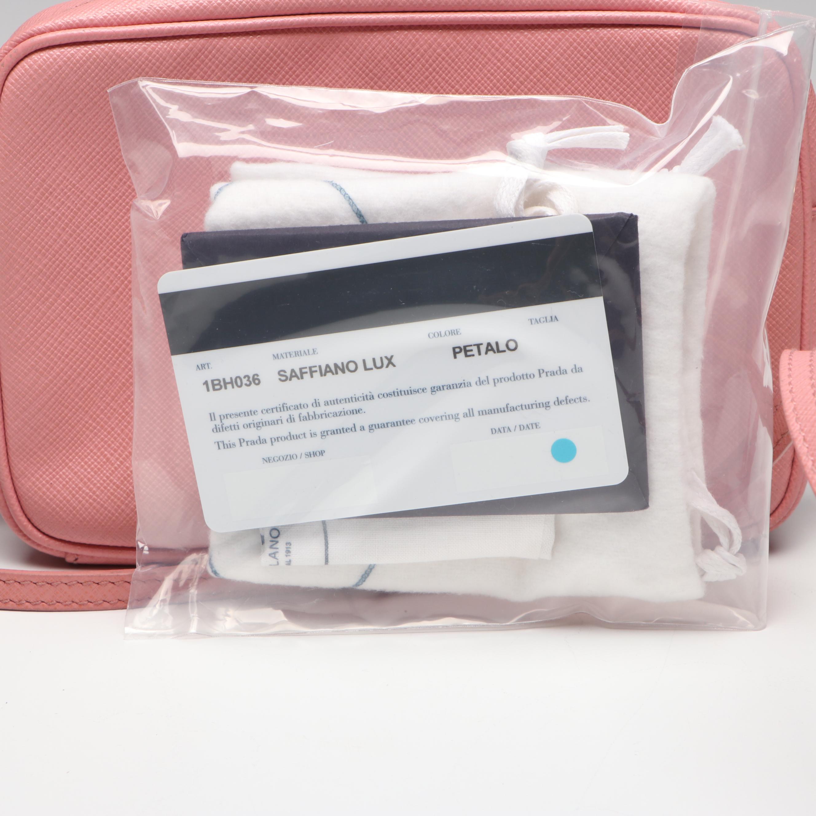 Prada Small Camera Crossbody Bag in Light Pink Saffiano Lux leather