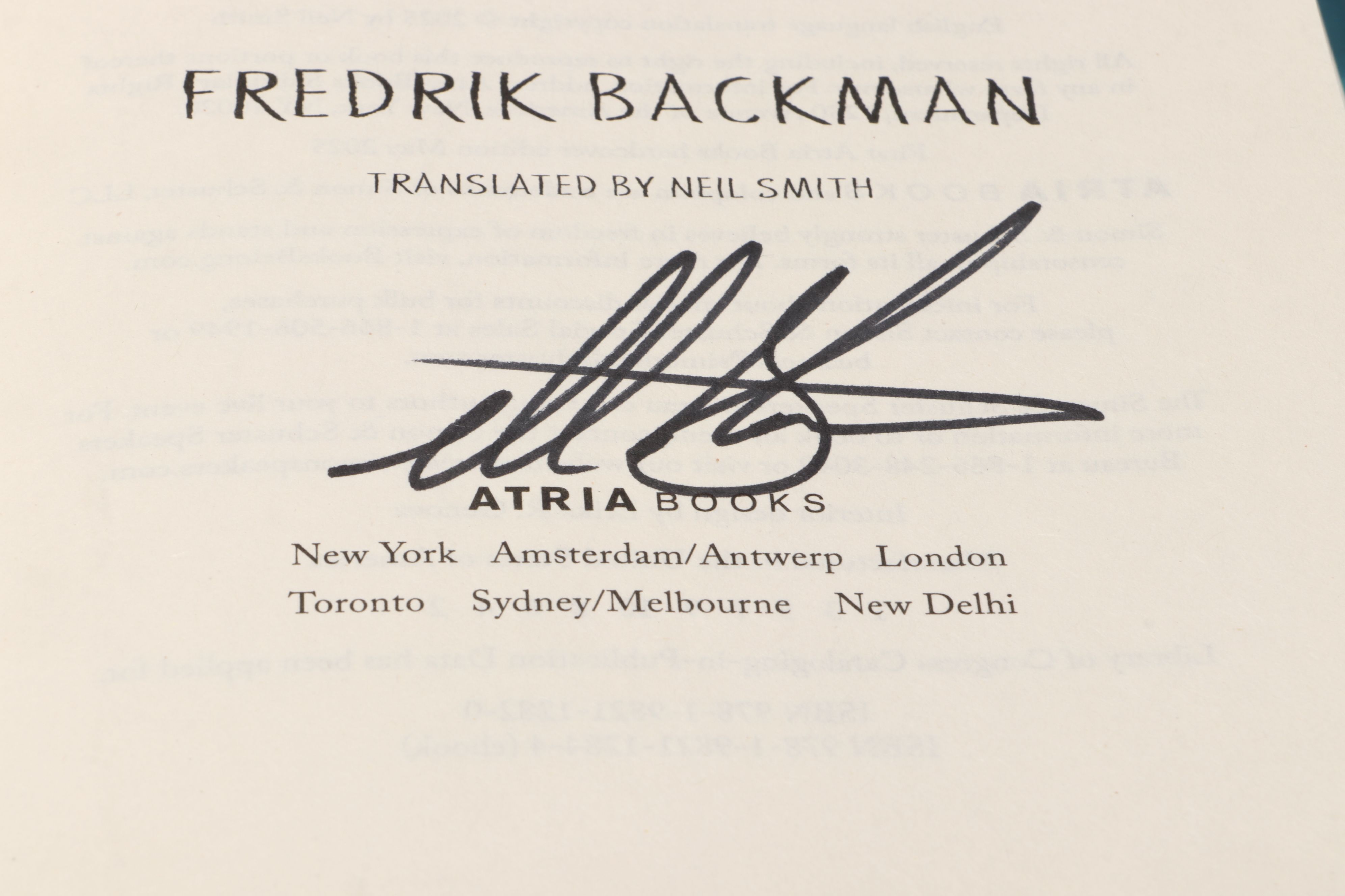 Signed "My Friends" by Fredrik Backman and "Met the End" by Holly Brians Ragusa